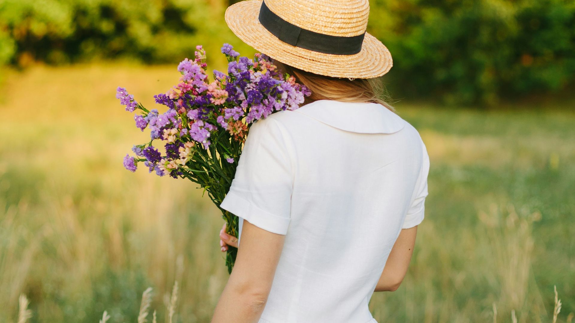 woman holding flowers