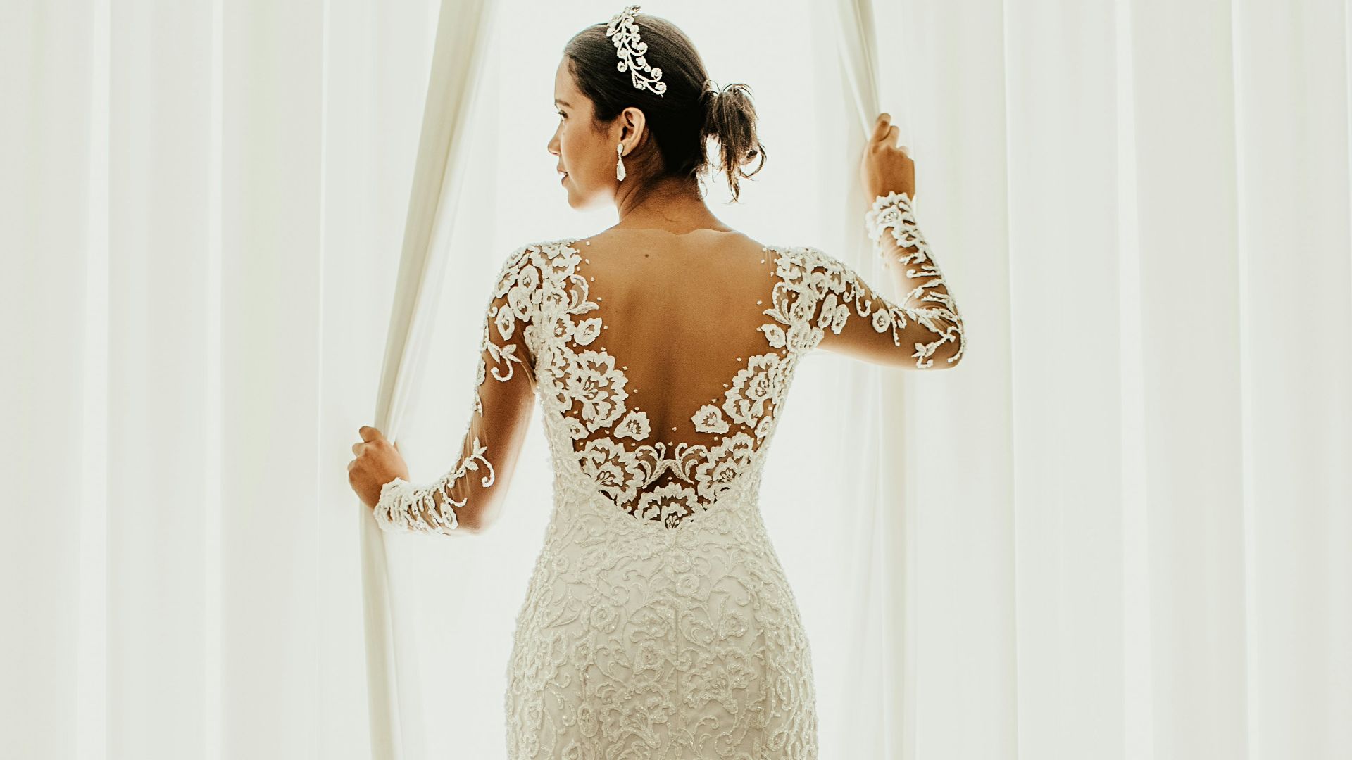 woman in white floral wedding dress