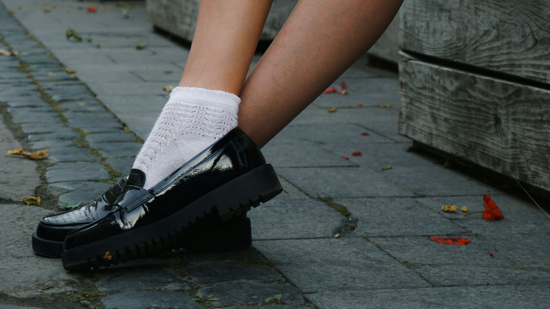 a person sitting on a bench