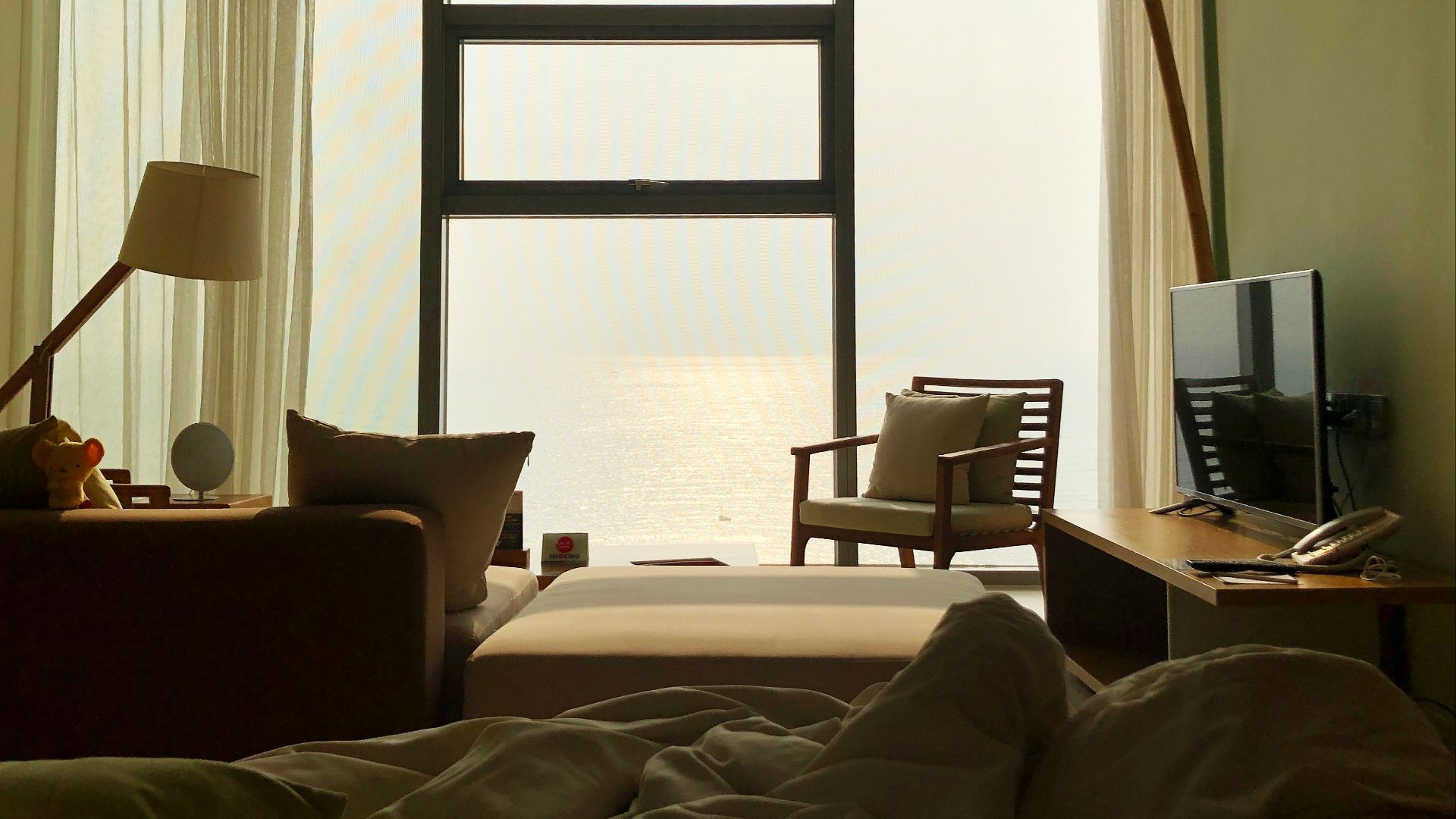 white bed comforter on bed mattress