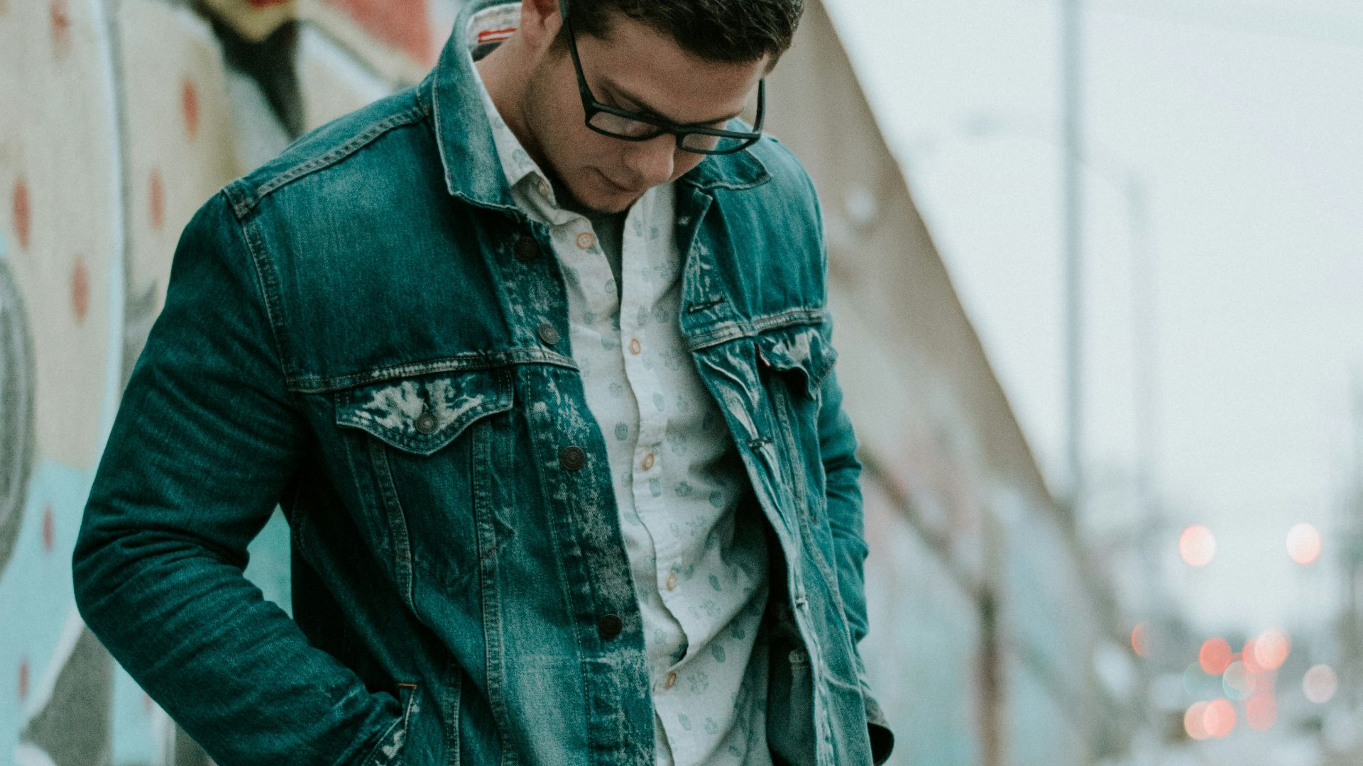 man inserting his hand on pocket