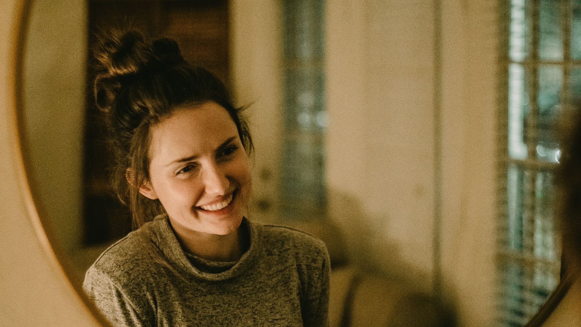 woman in gray crew neck shirt