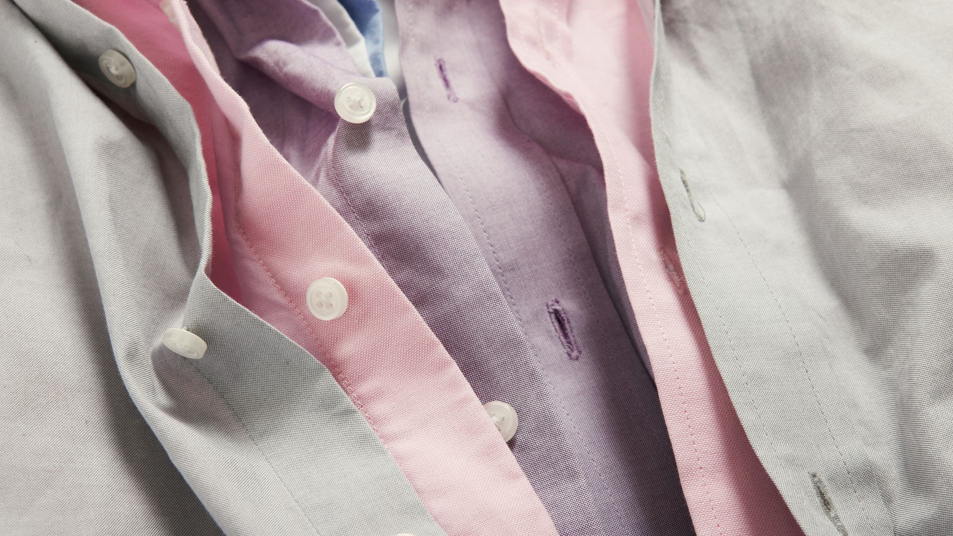 person wearing grey blazer