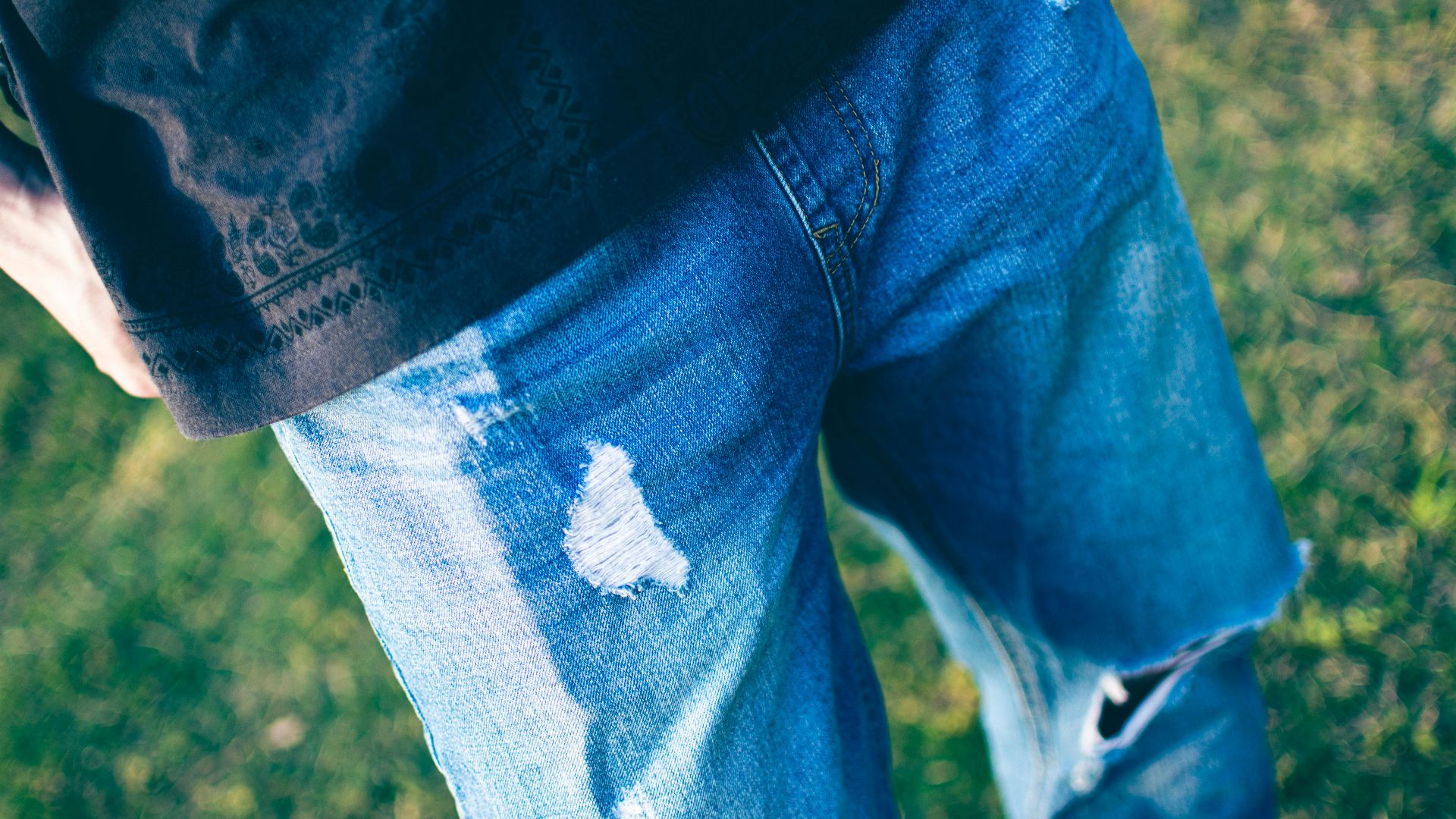 a person's legs and jeans
