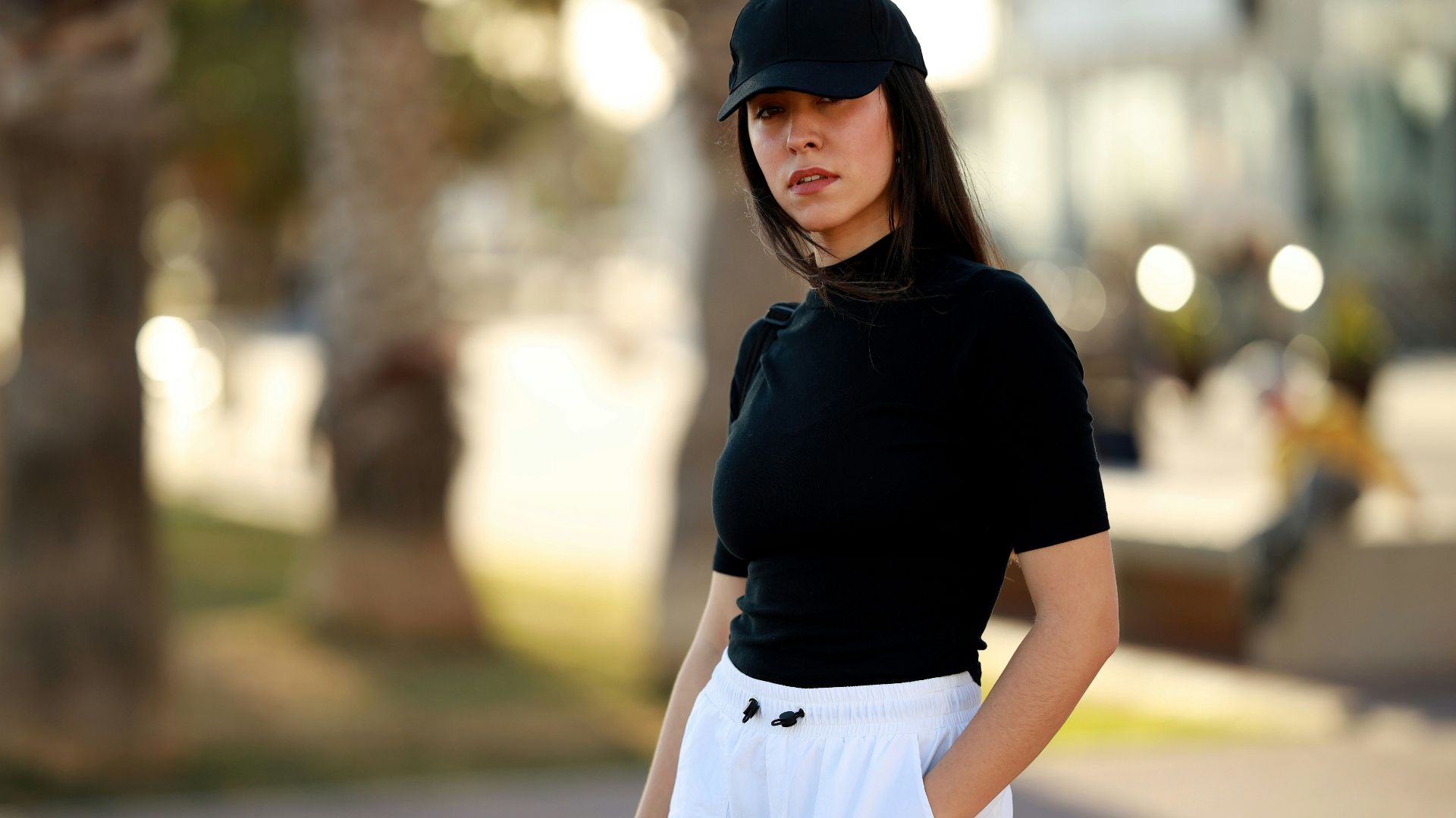 selective focus photography of woman wearing black turtle-neck elbow-sleeved shirt