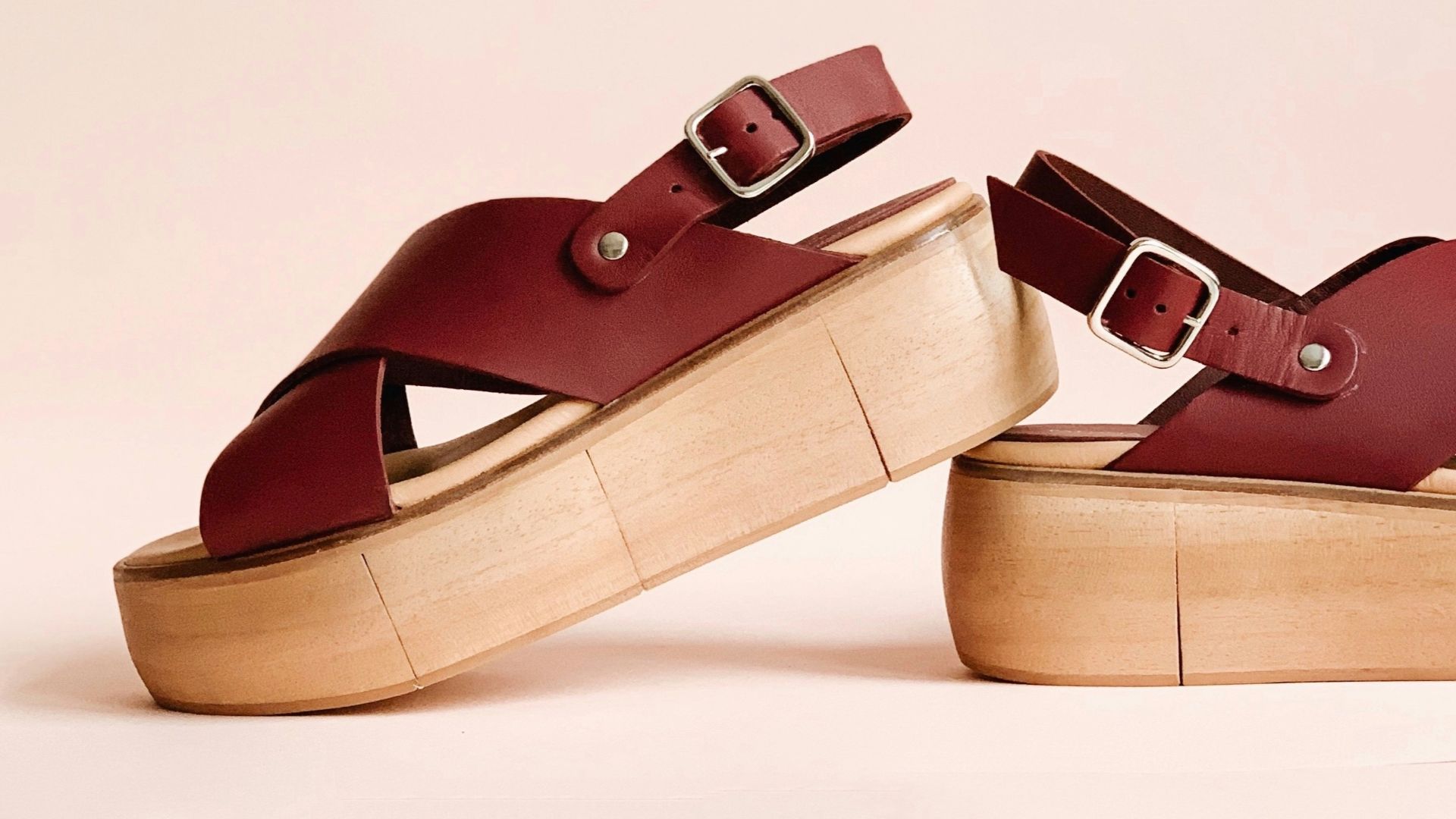 pair of maroon wedges