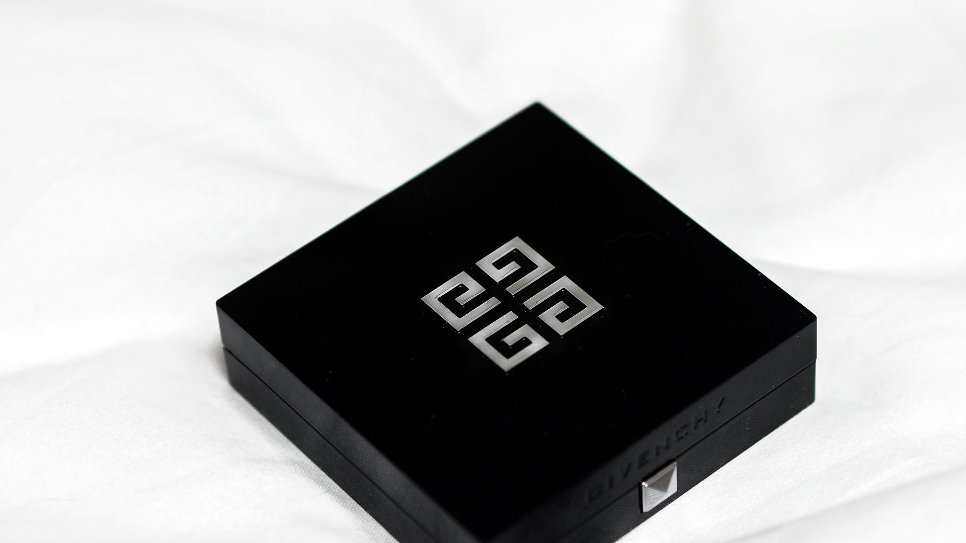 black box on white textile