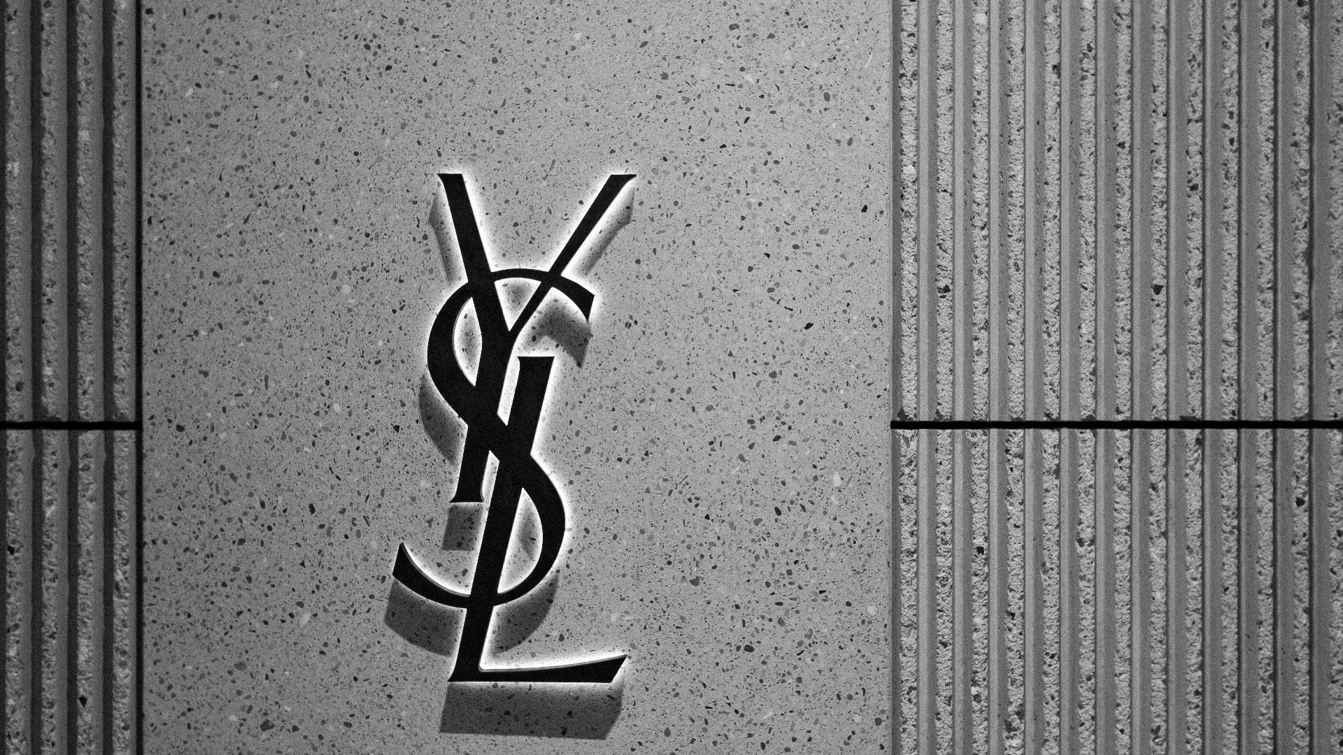 A black and white photo of a saint louis logo