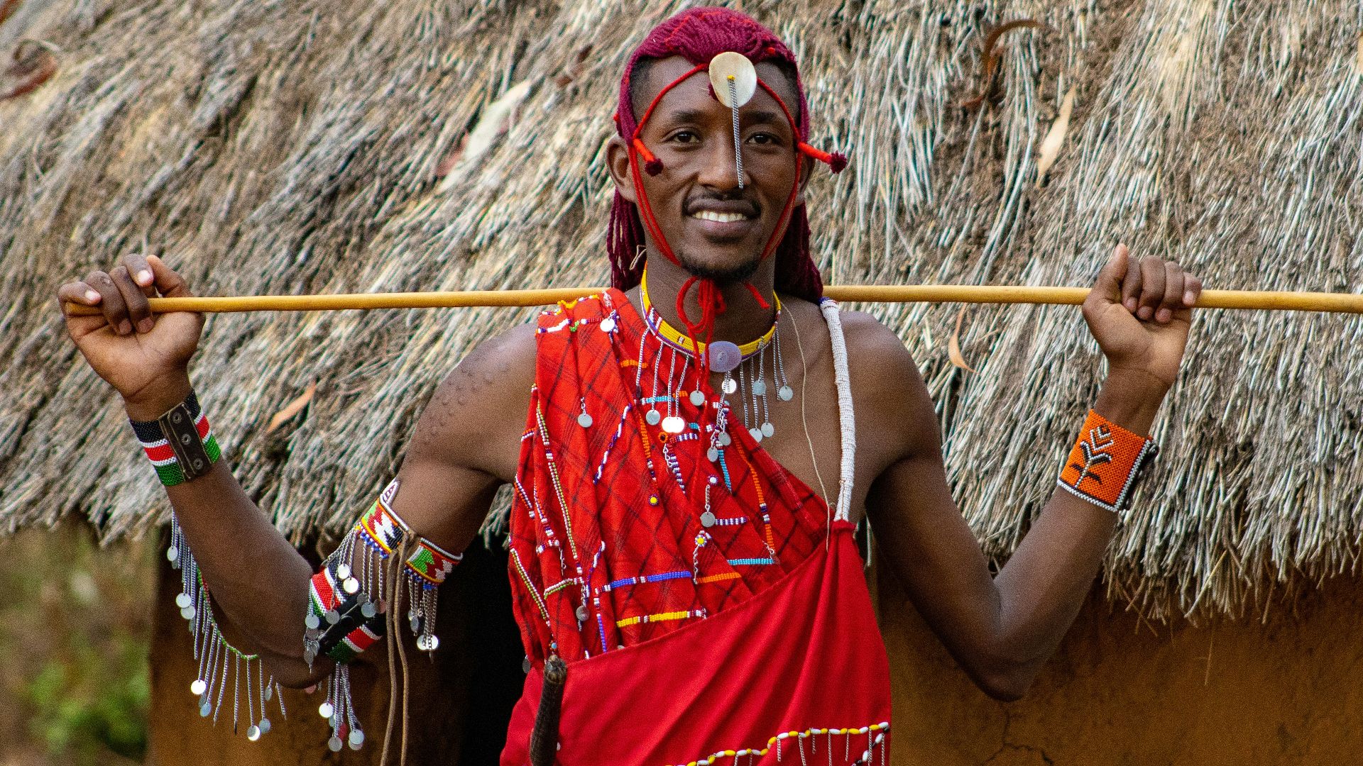 a man with a stick in his hand