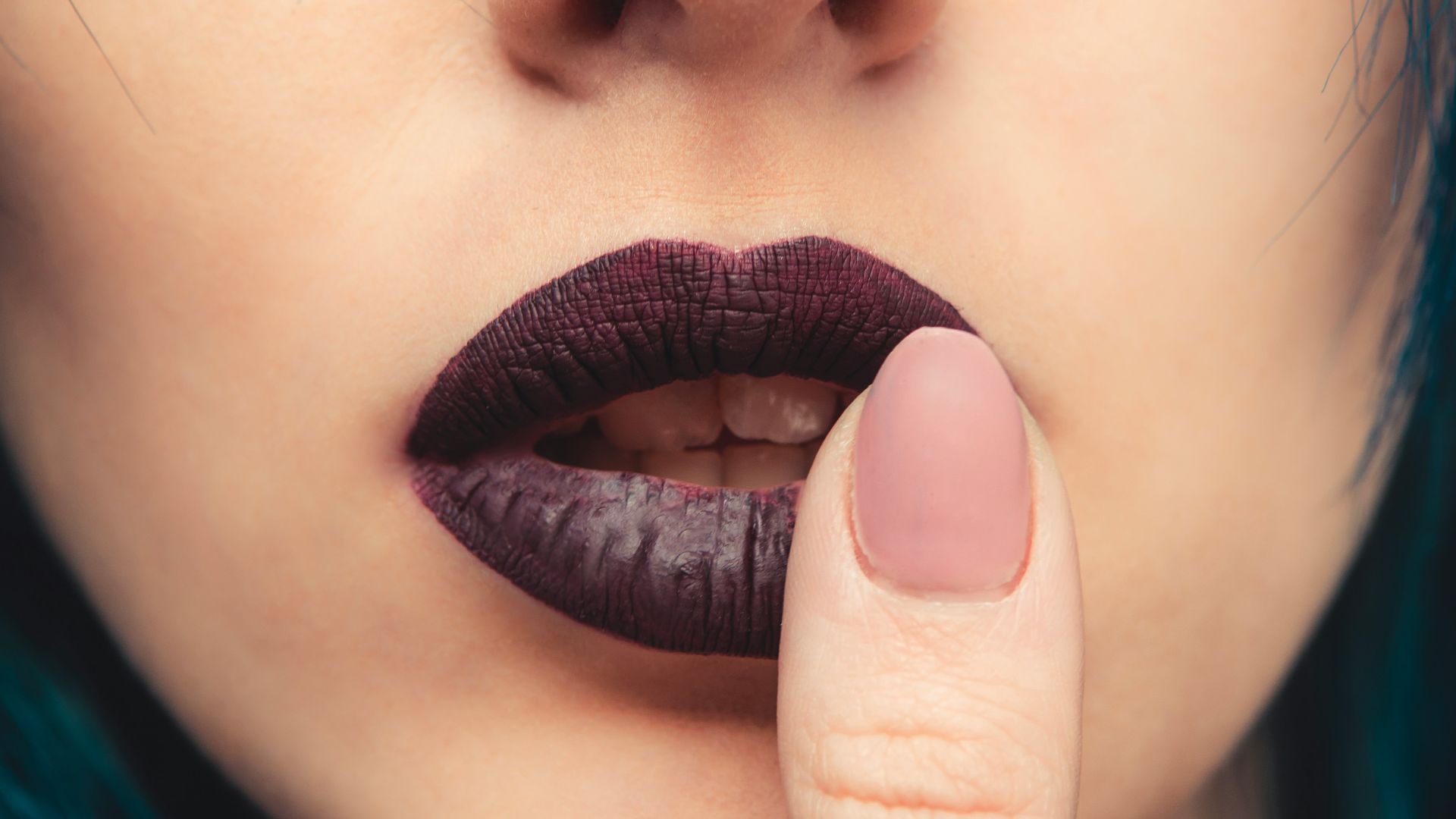 woman wearing black lipstick