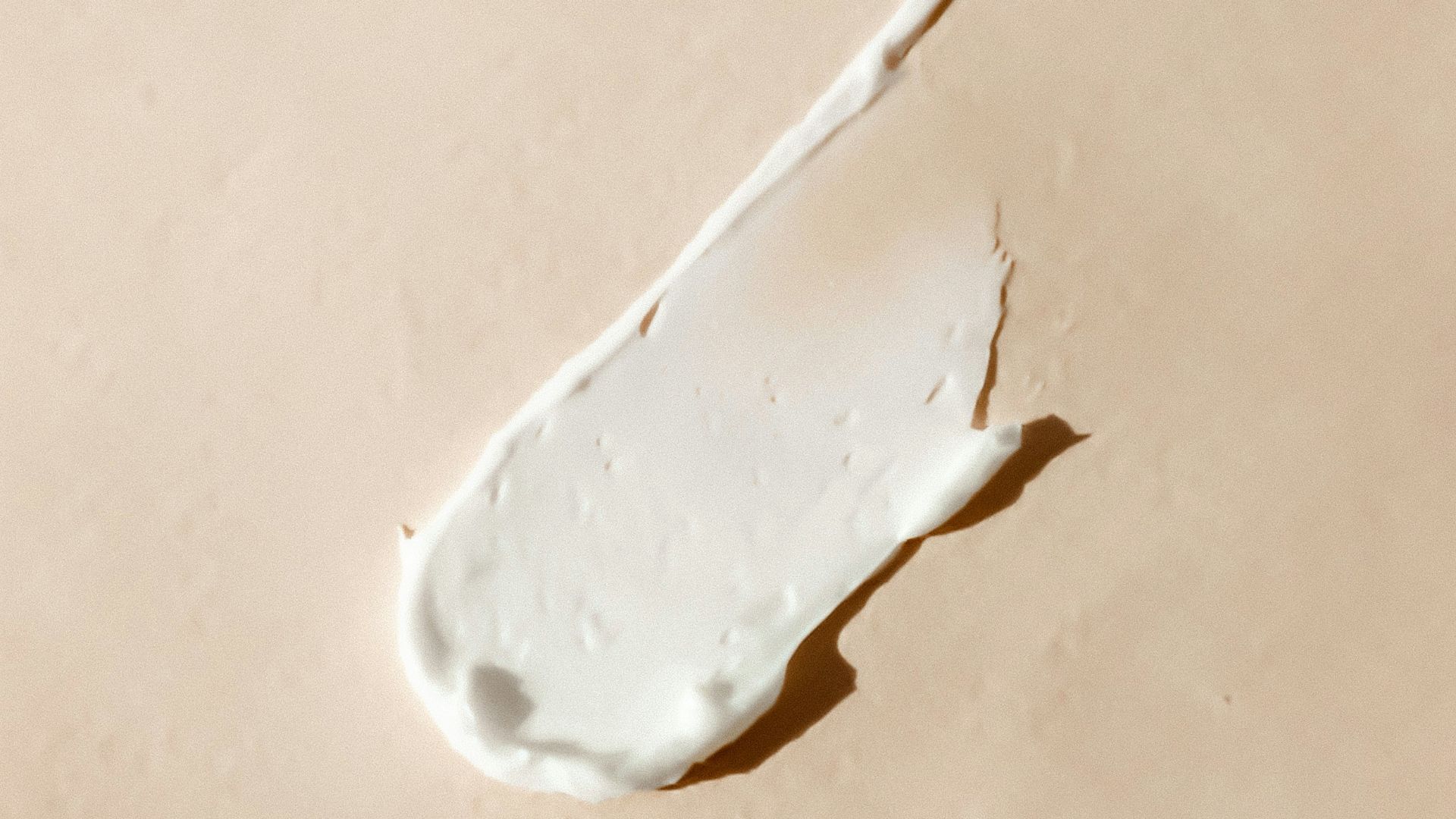 white cotton buds on white surface