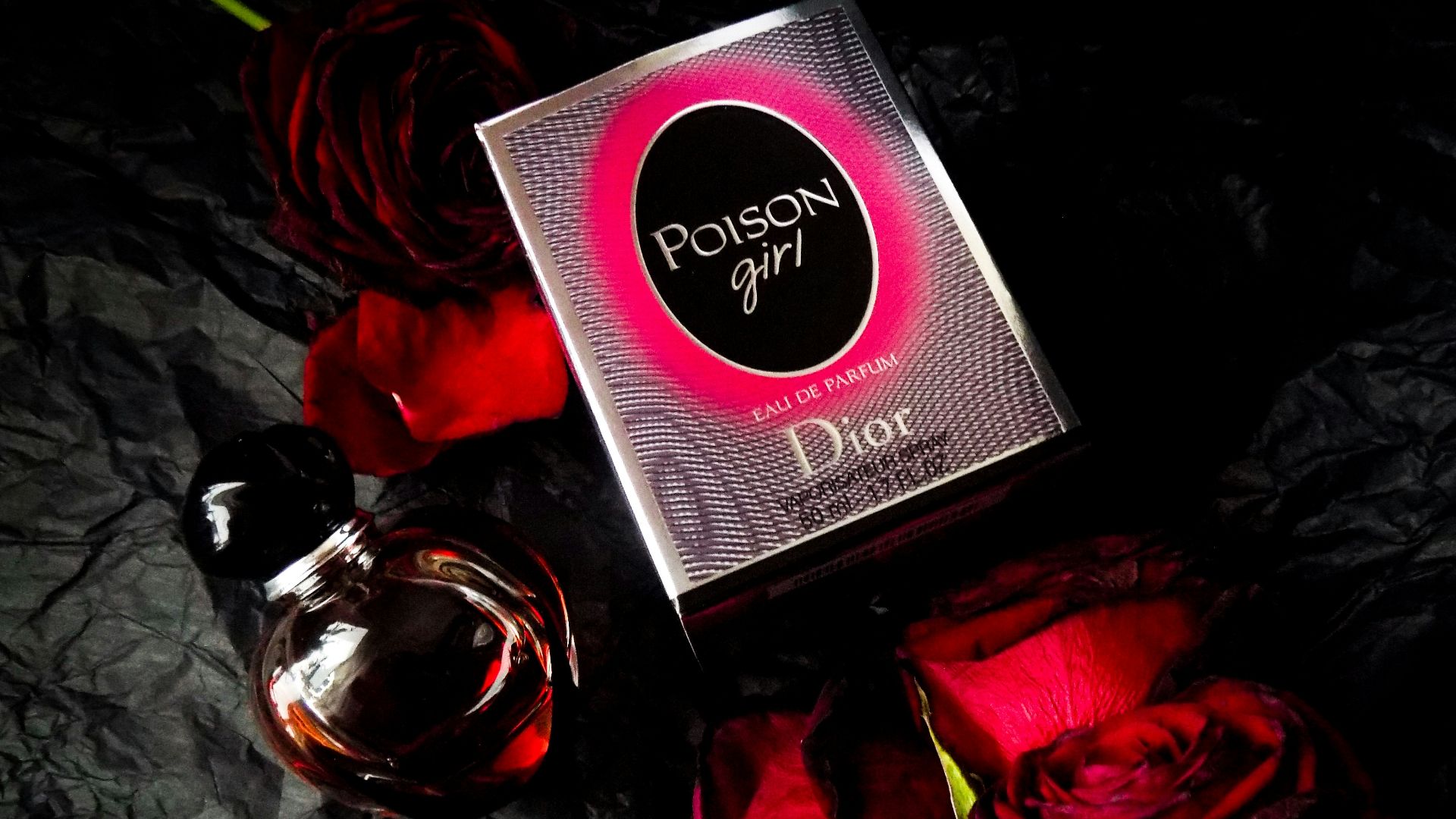 red rose and gold perfume bottle