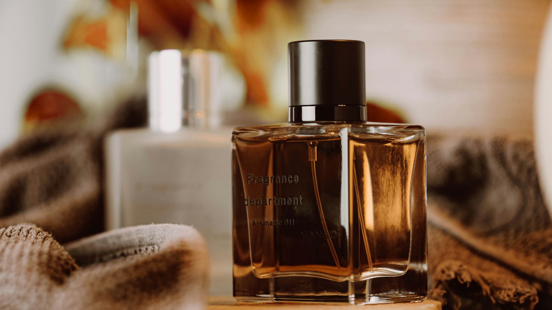 a bottle of perfume sitting on top of a table