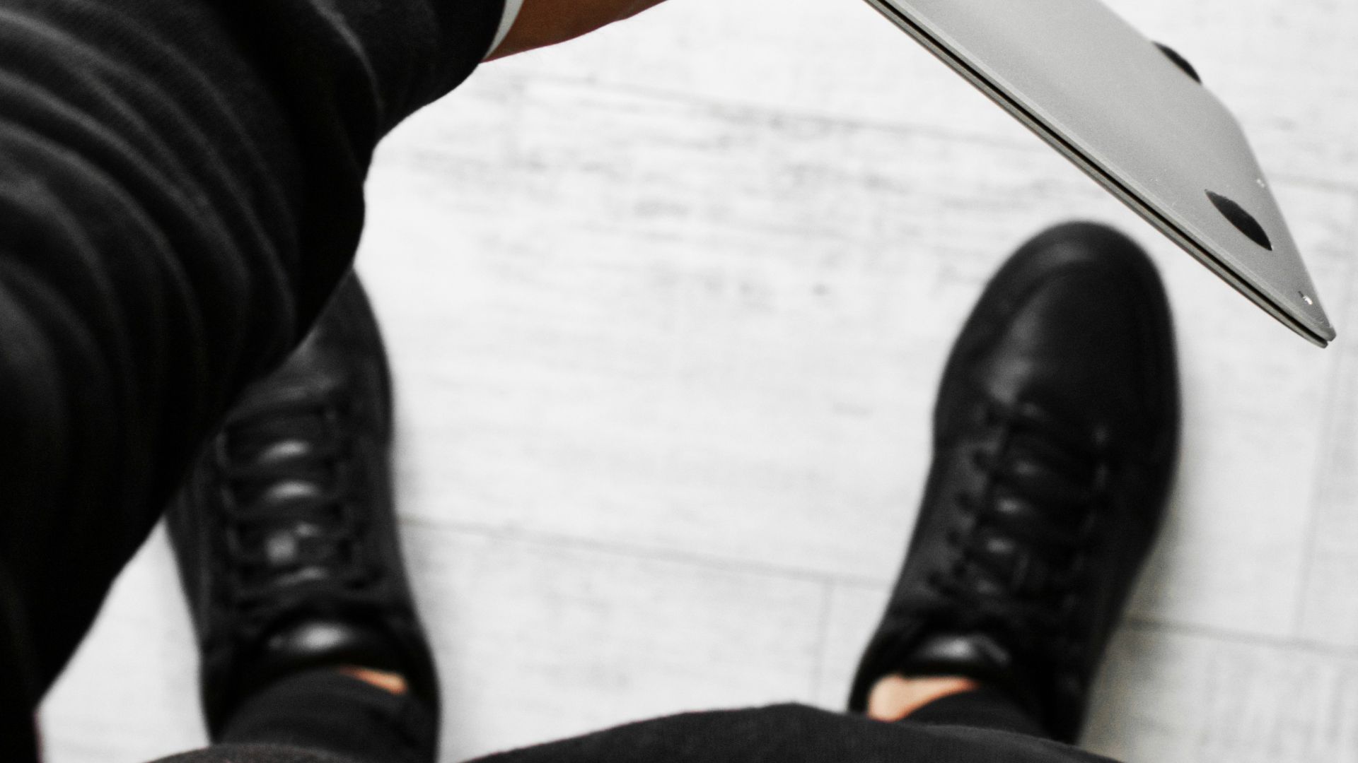 person holding silver kitchen knife