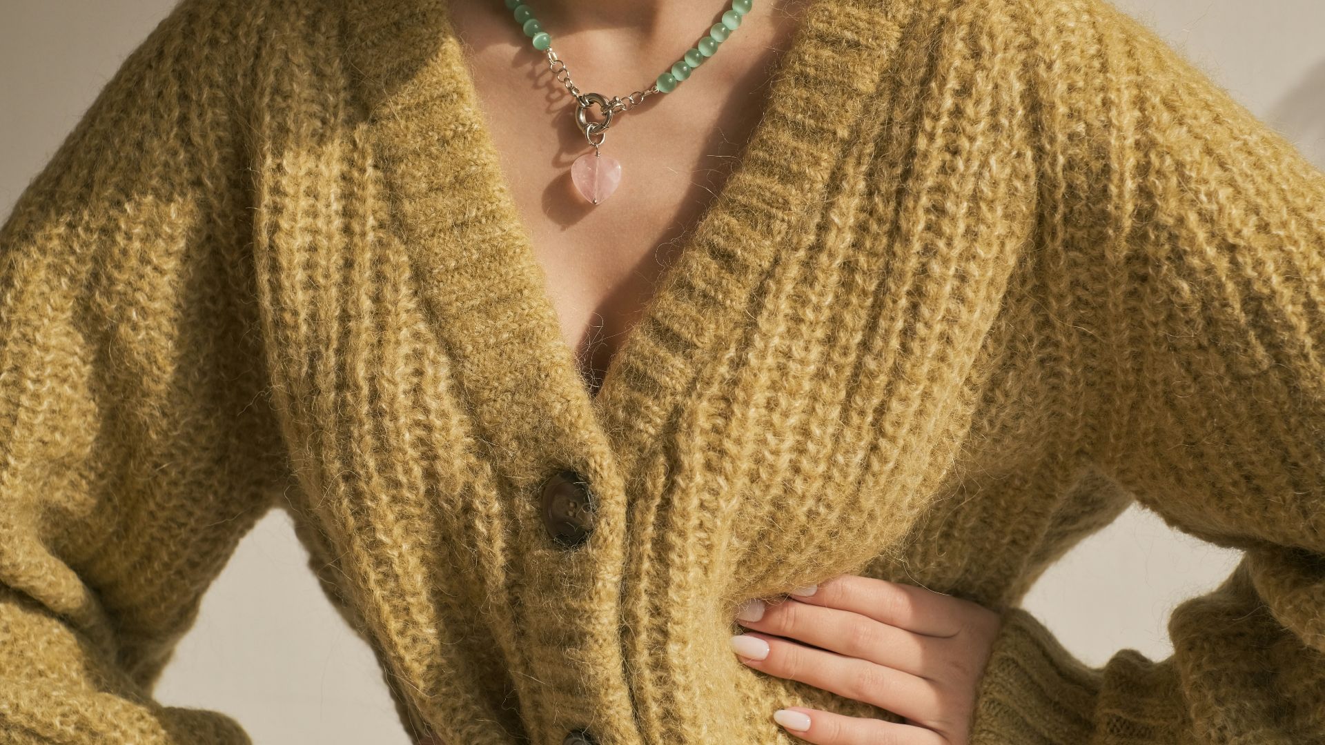 woman in yellow knit cardigan