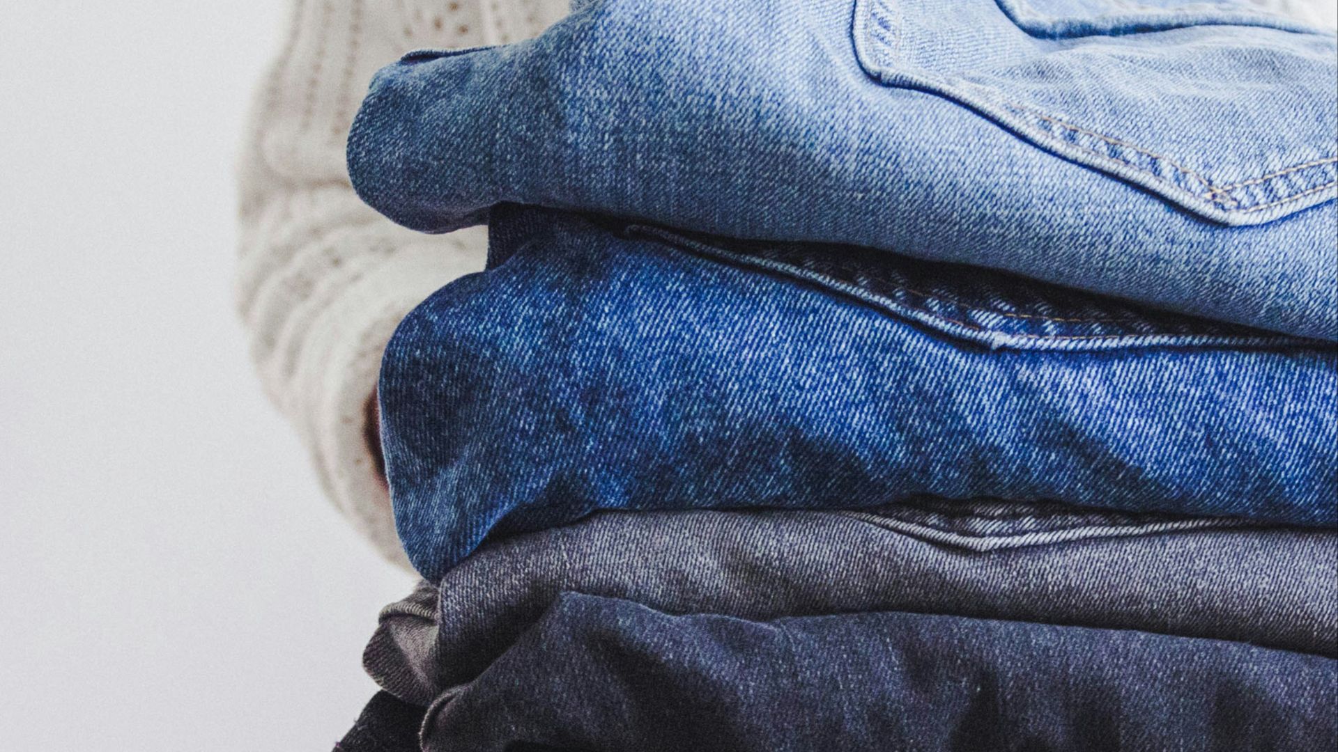 blue and white textile on white textile