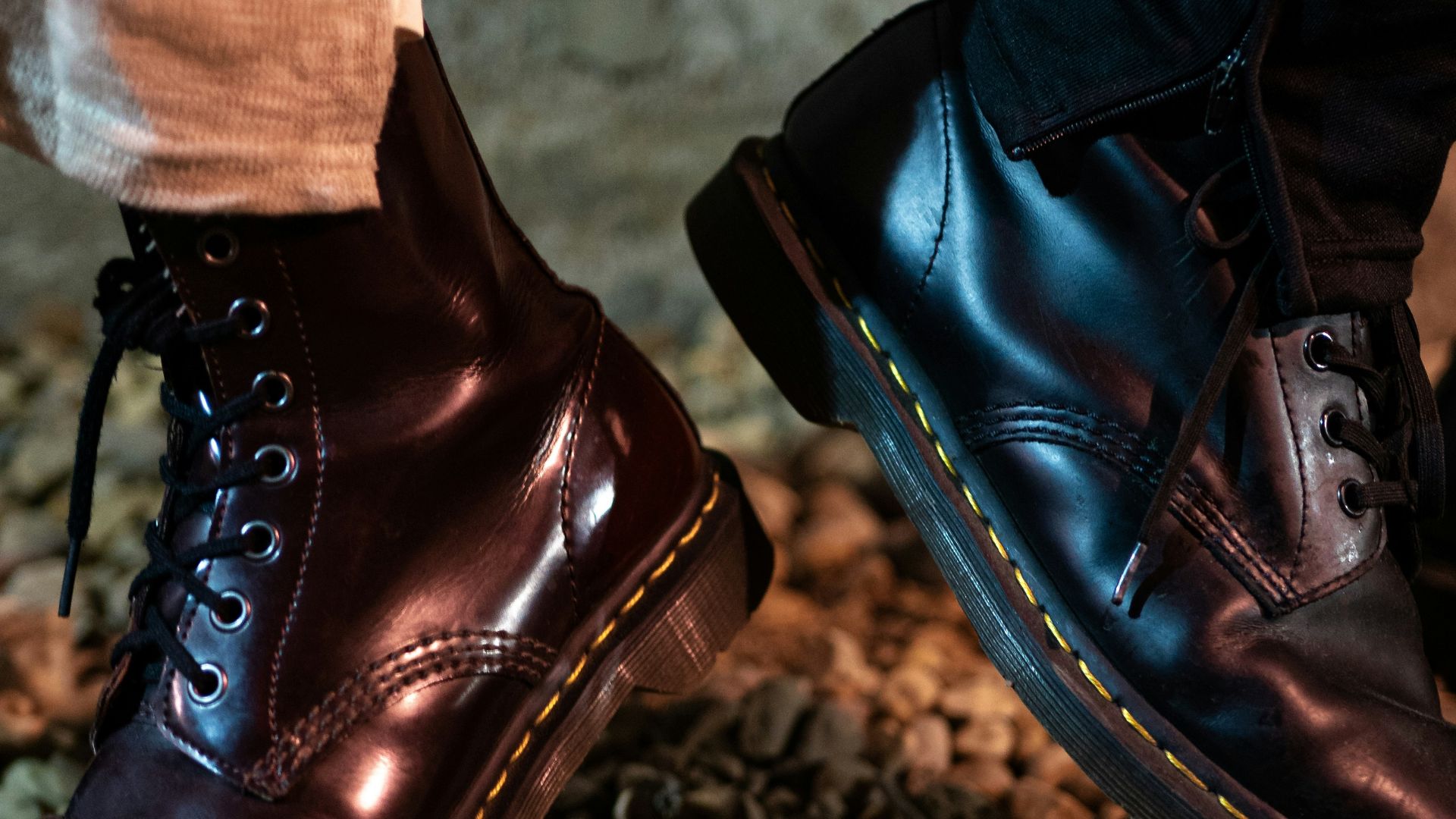 a close up of a pair of shoes on a rocky ground