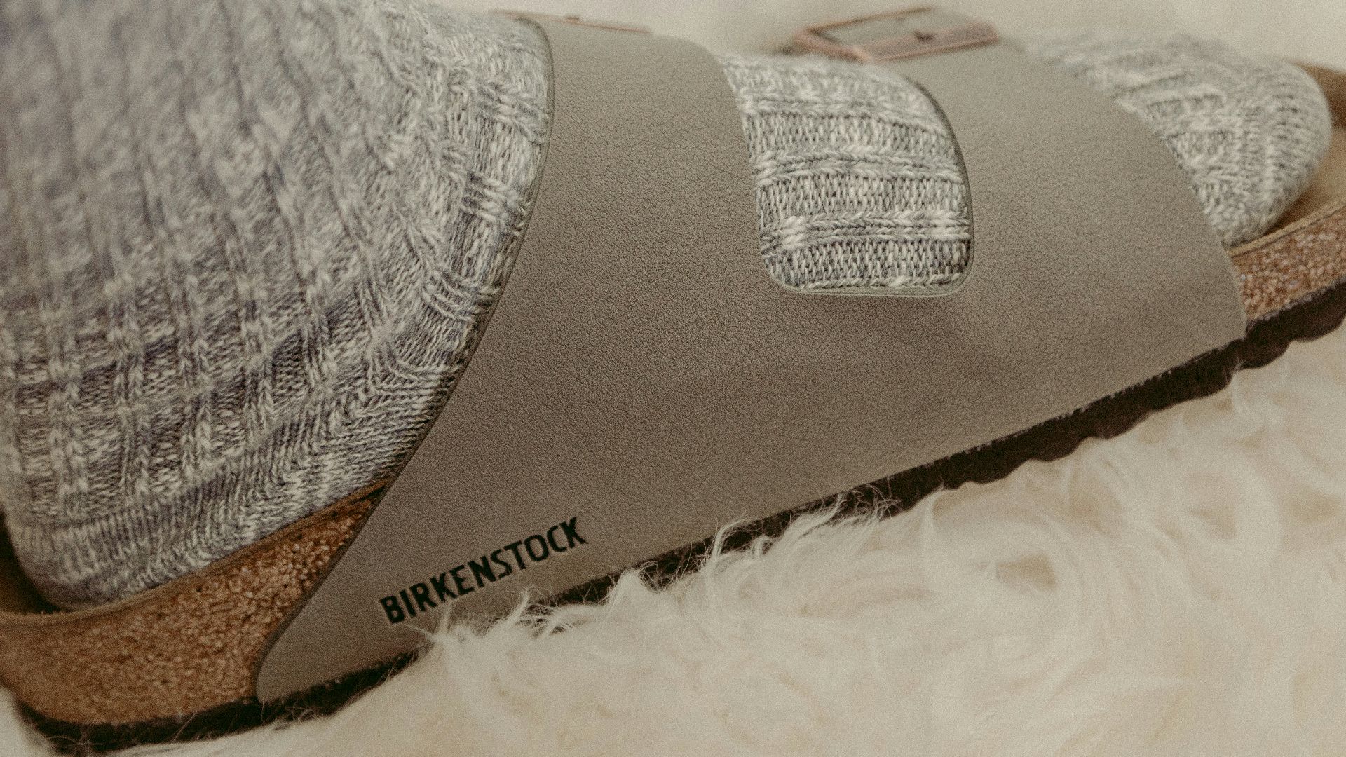 gray and brown sock on white textile