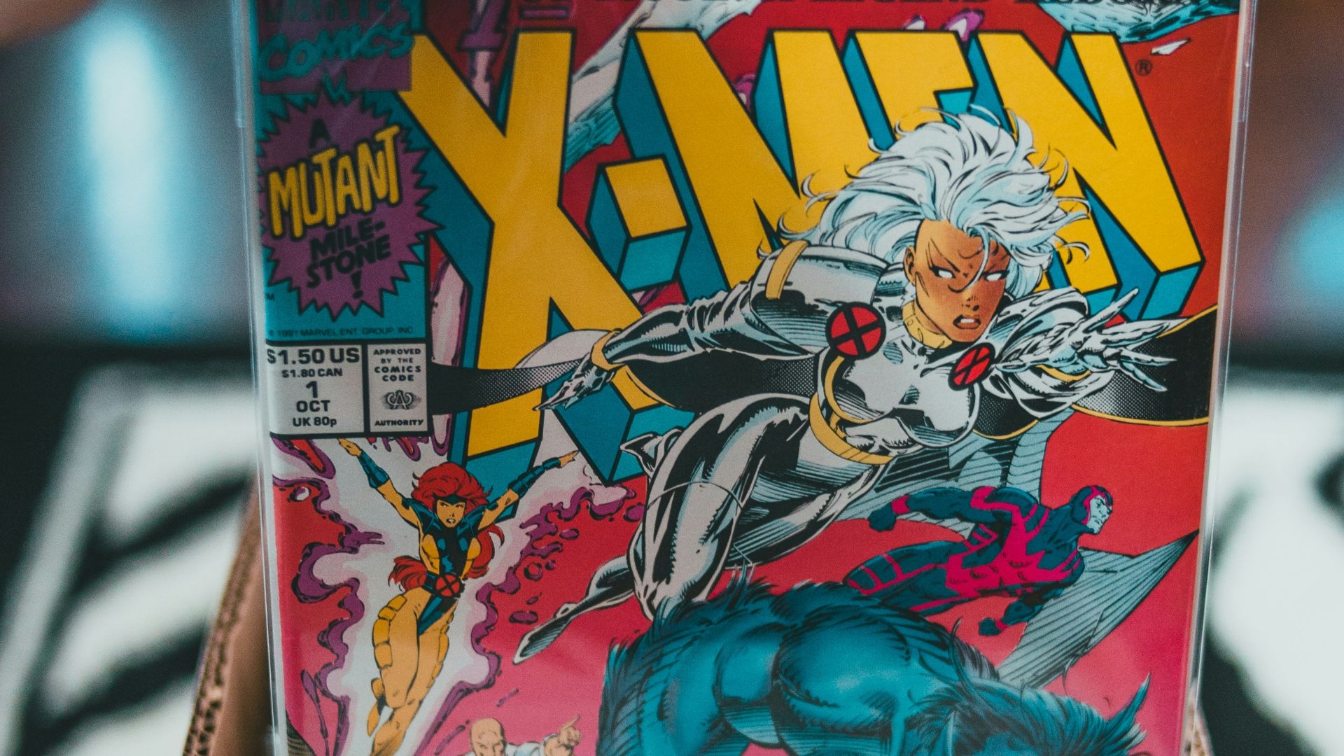 person holding dragon ball z comic book