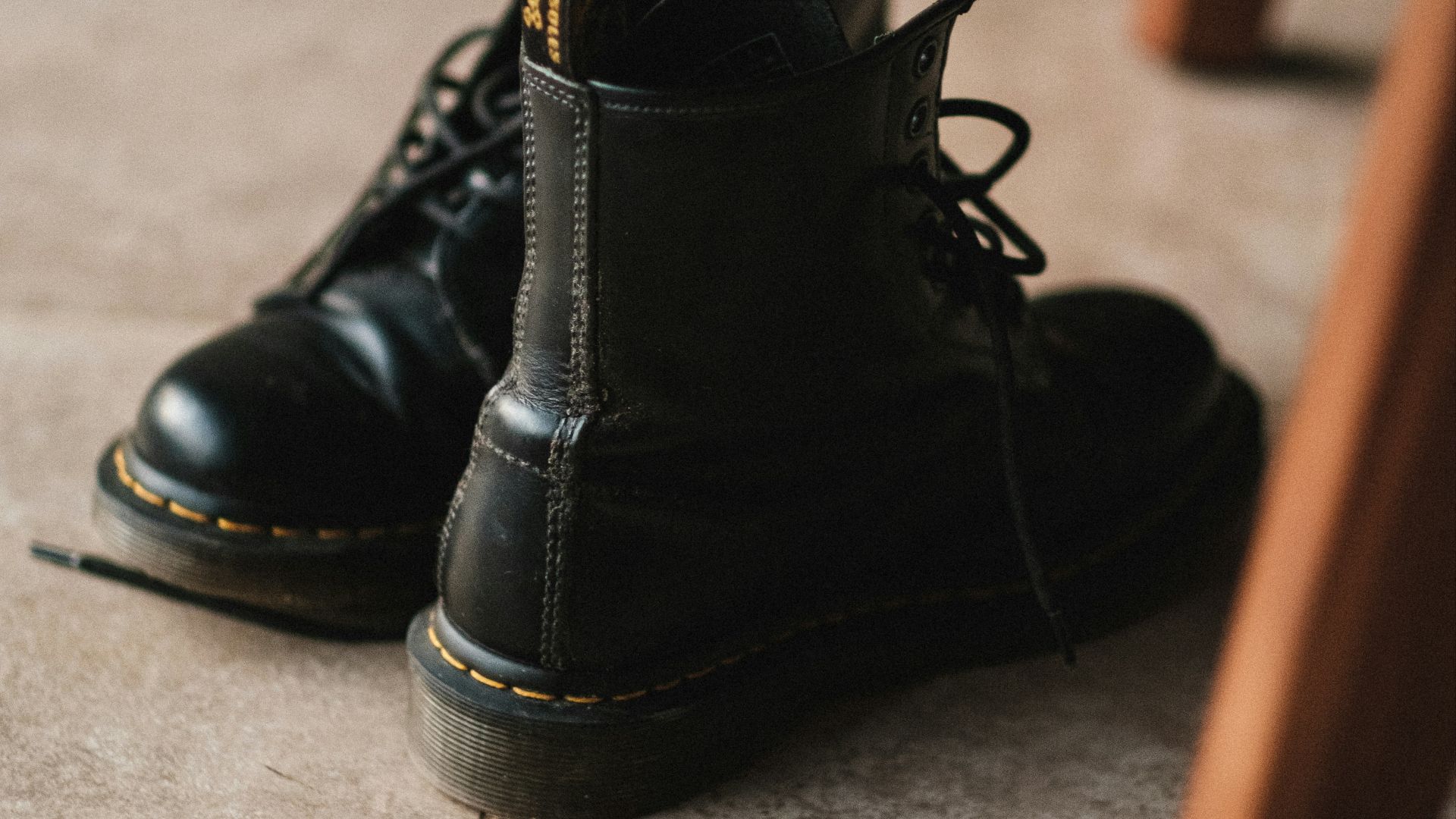 black leather lace up boots