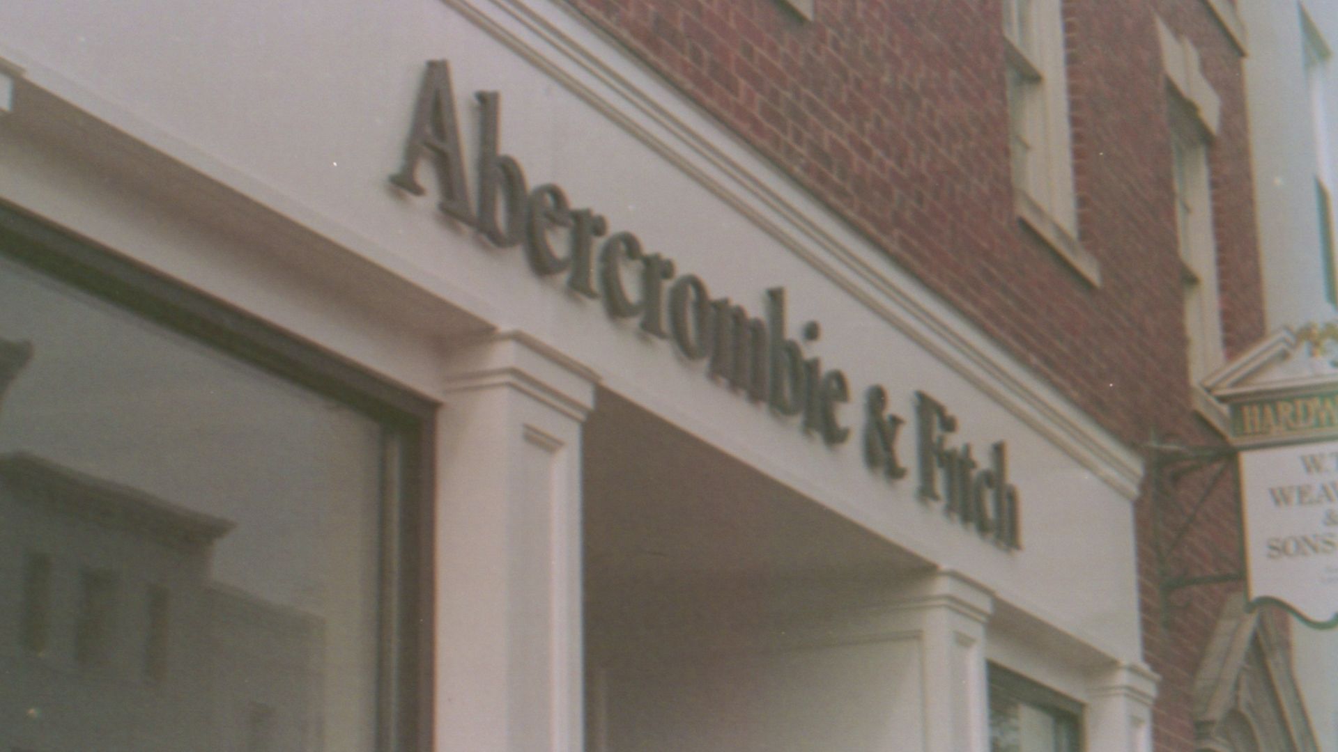a building with a sign that says aberconiict & chik