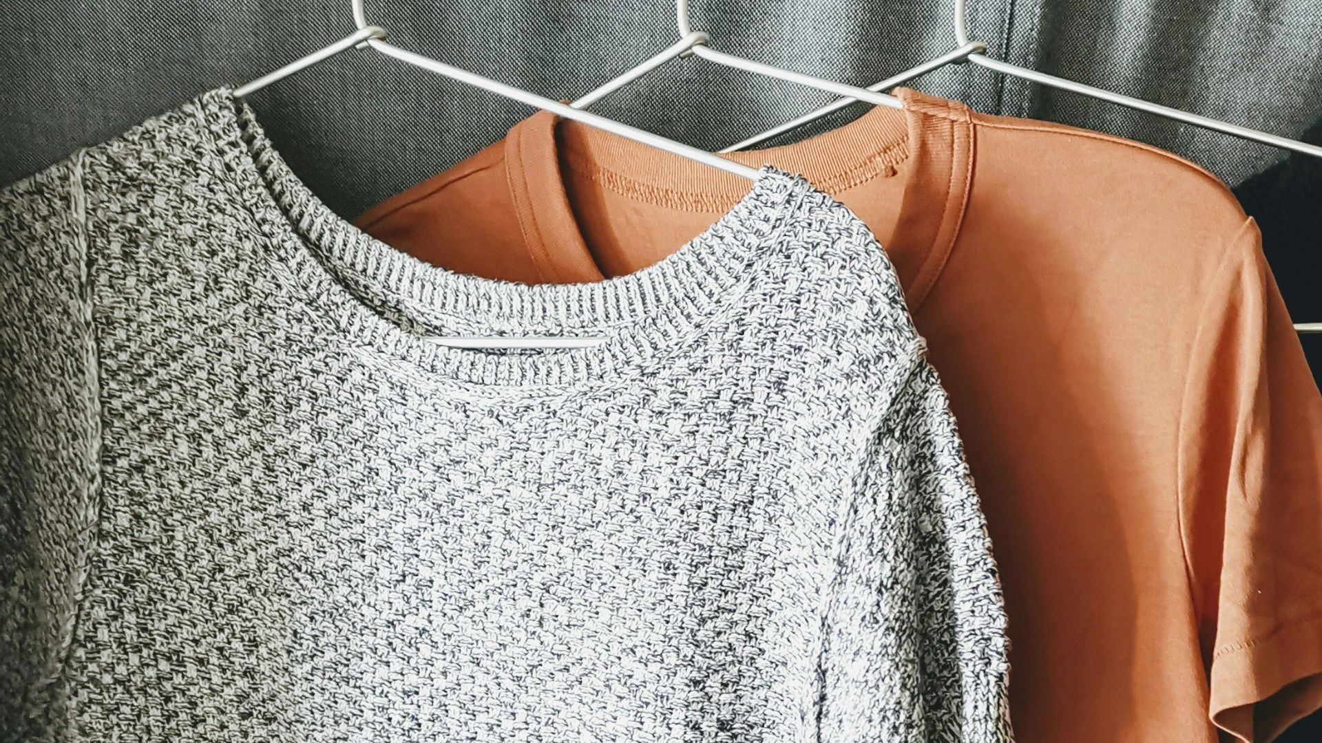 three assorted-color shirts