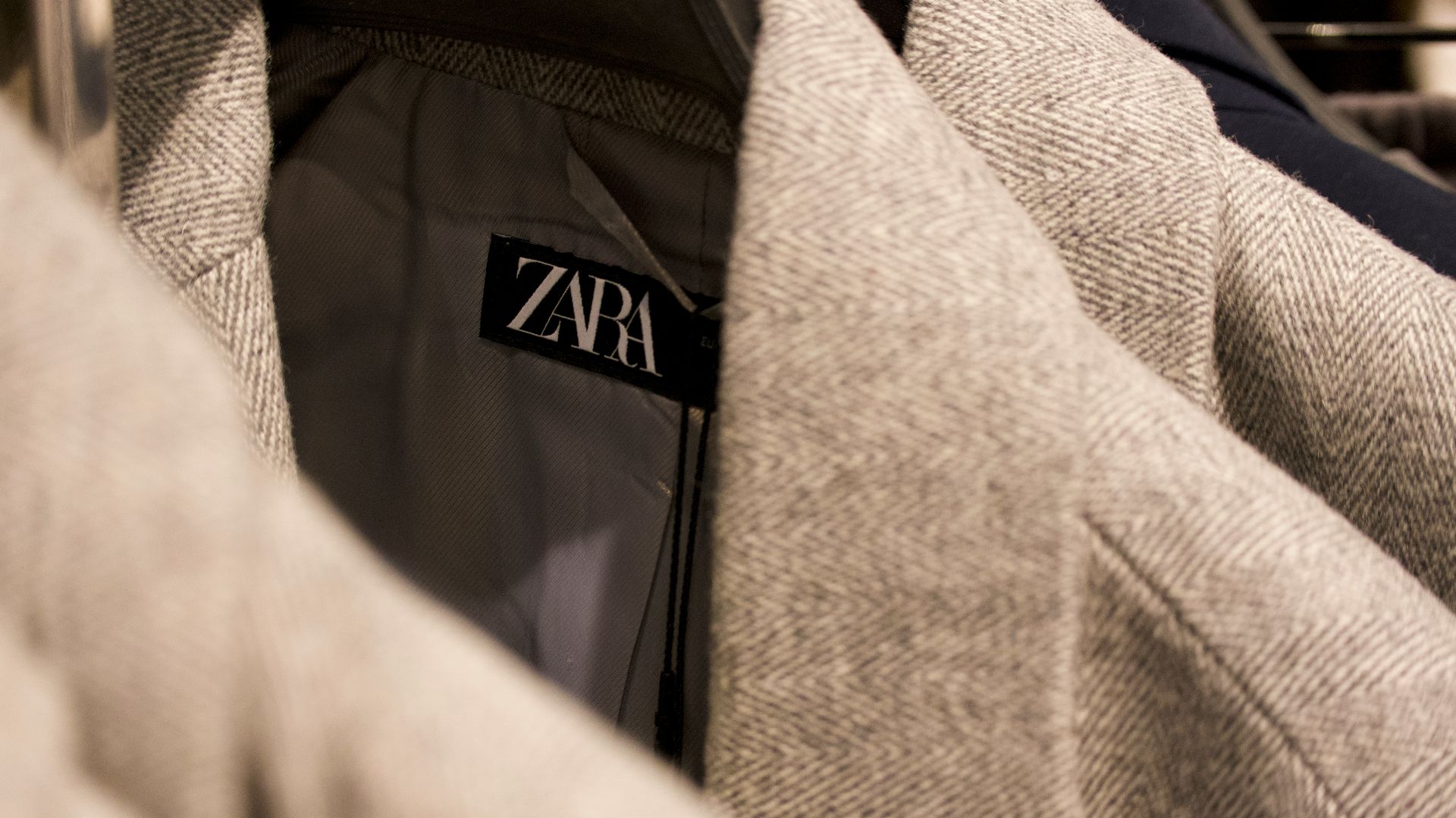 a close up of a jacket with a name tag on it