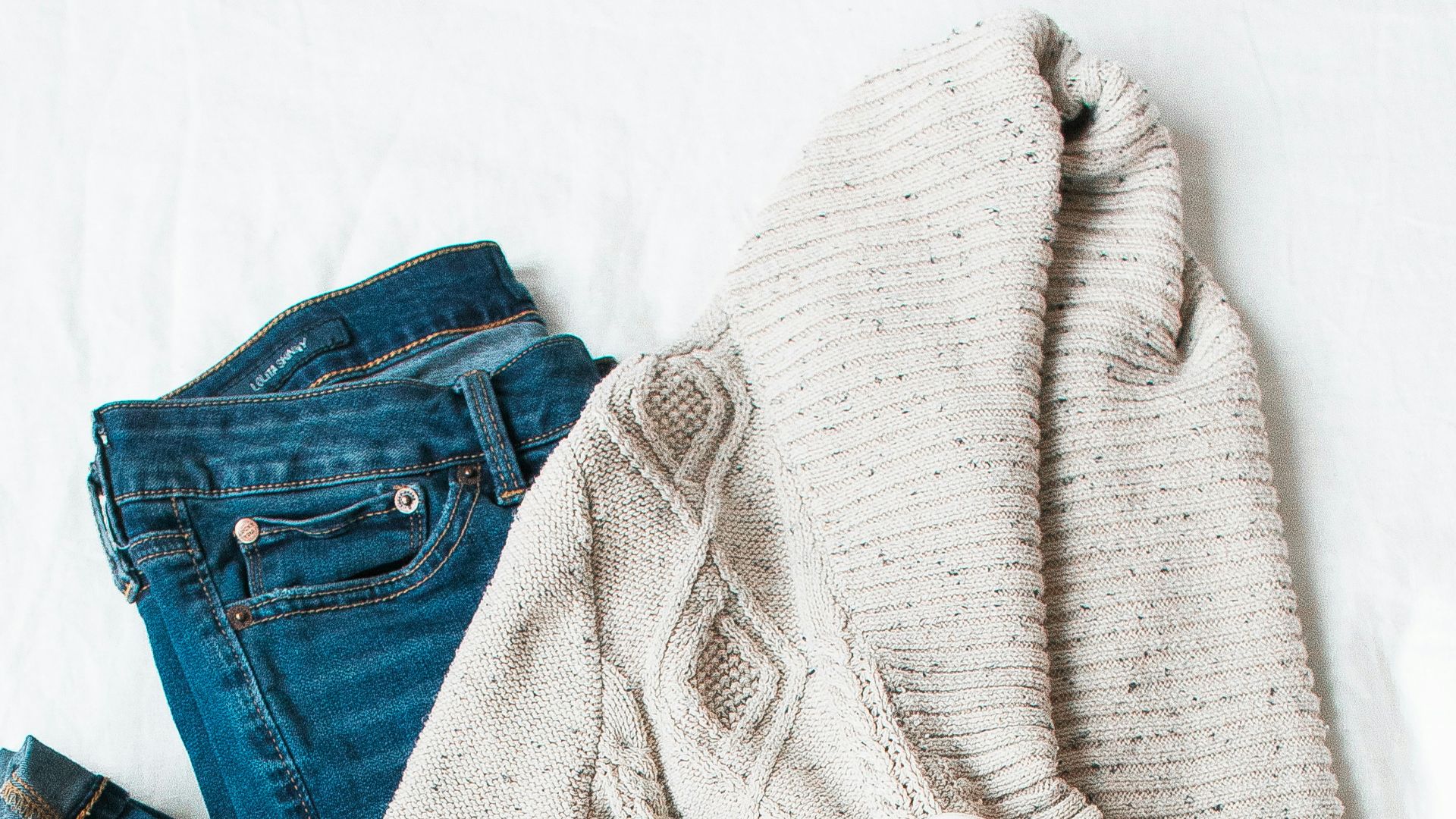 gray cardigan, blue jeans, and pair of brown chunky heeled shoes