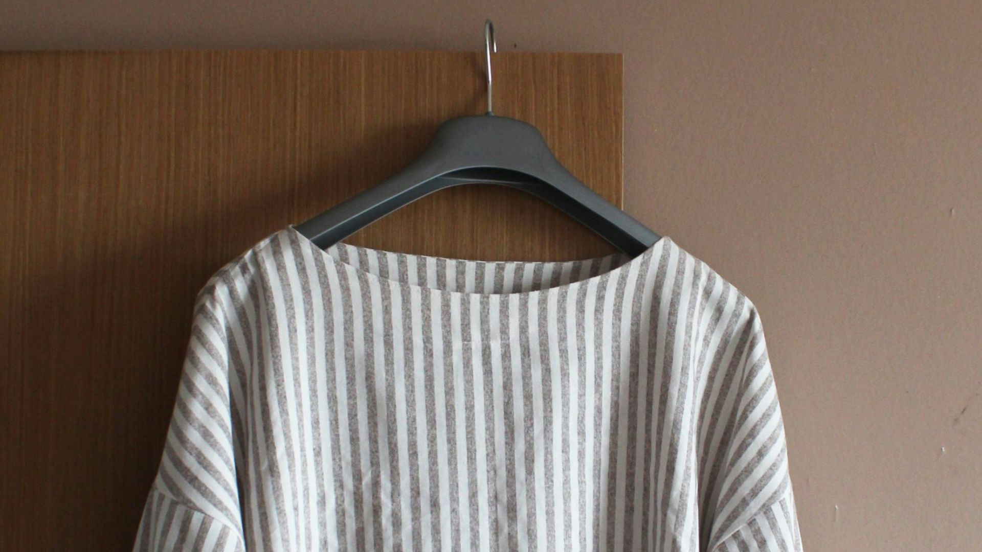 white and black striped long sleeve shirt