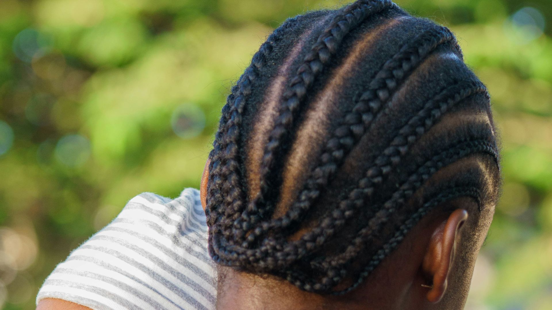 a woman holding a baby in her arms