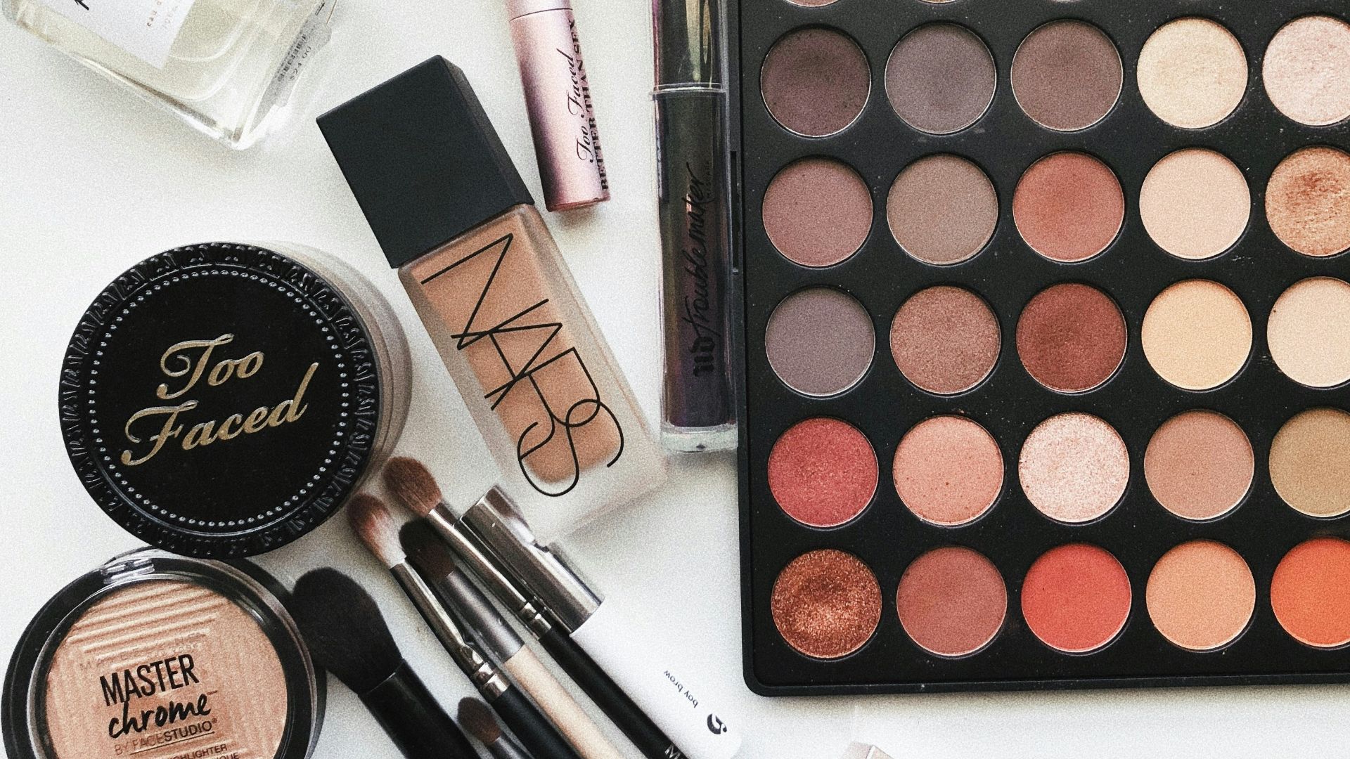 close-up photography of assorted cosmetics