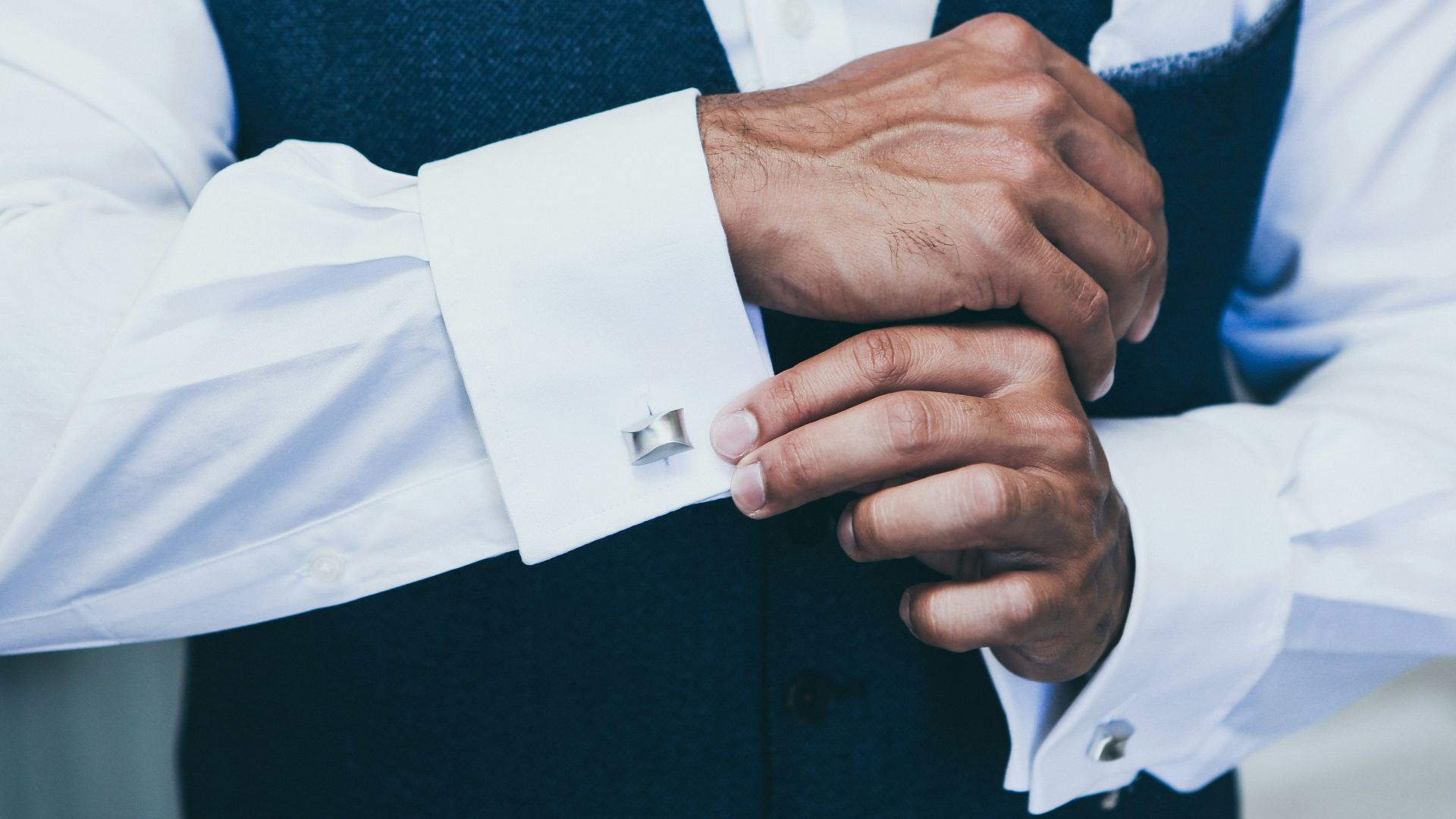 person wearing white dress shirt