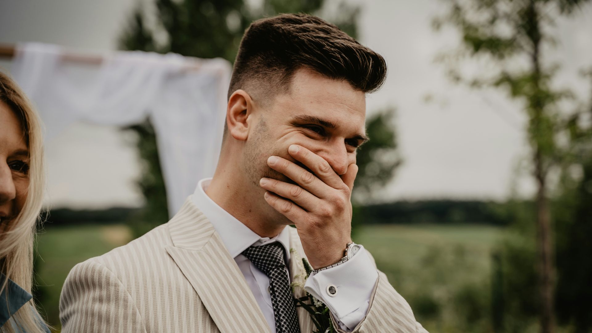 man in white and black pinstripe dress shirt
