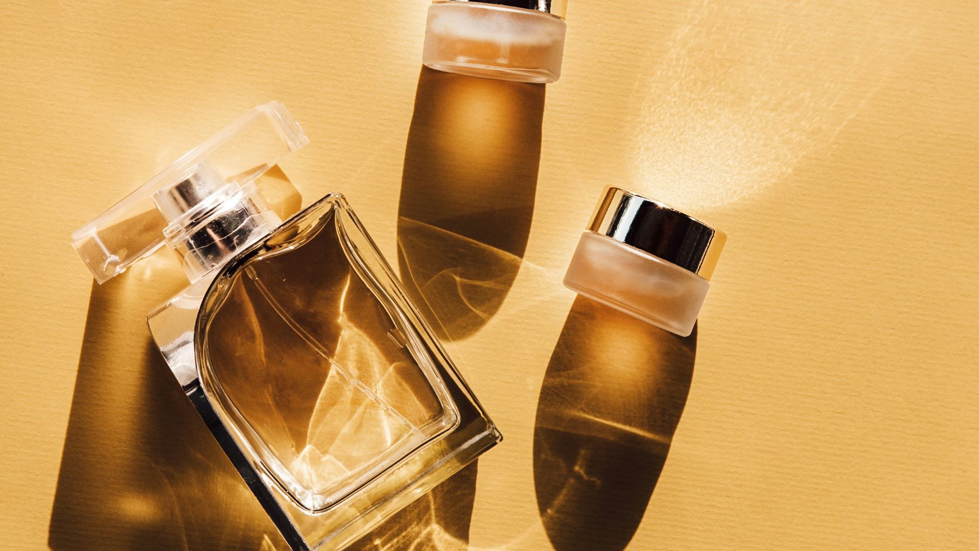 two clear glass perfume bottles