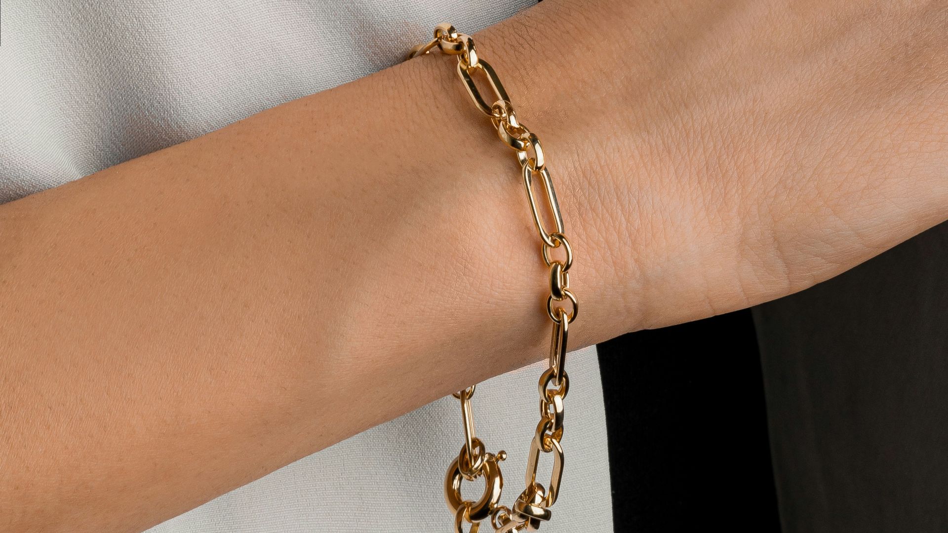 a close up of a person wearing a bracelet