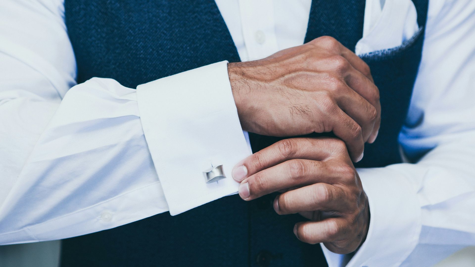 person wearing white dress shirt