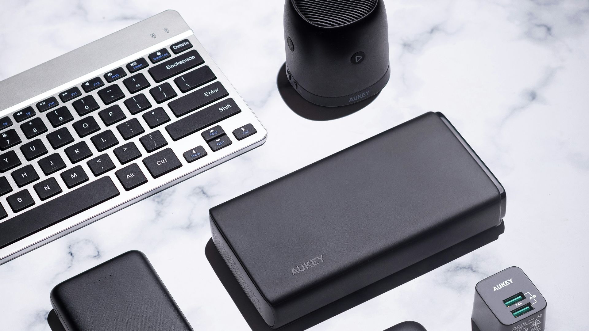 black android smartphone beside black smartphone