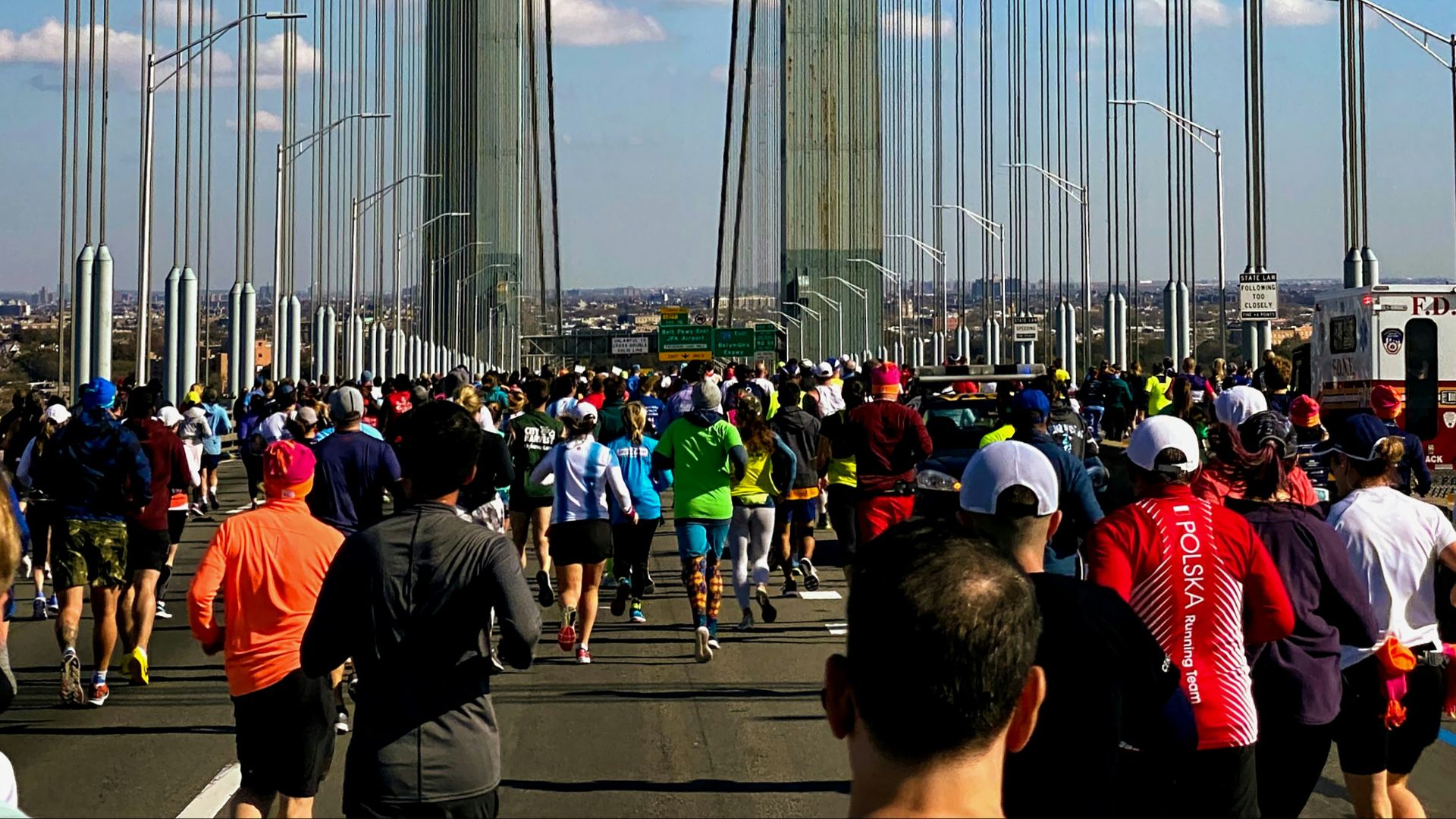 people walking on bridge during daytime