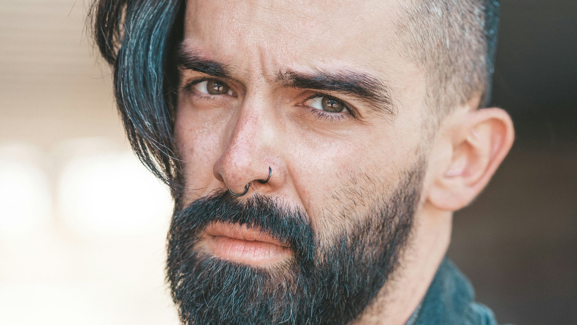 man wearing blue denim jacket