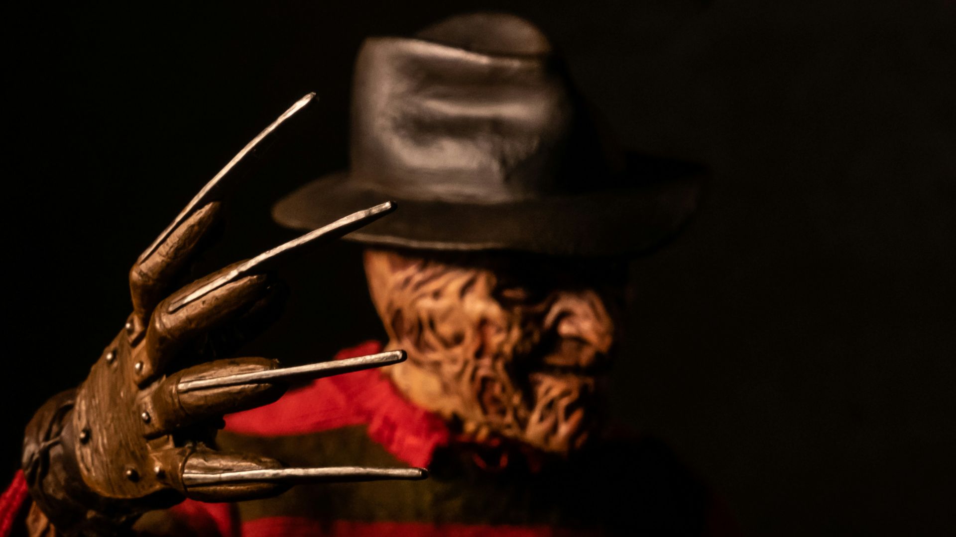 man in brown cowboy hat