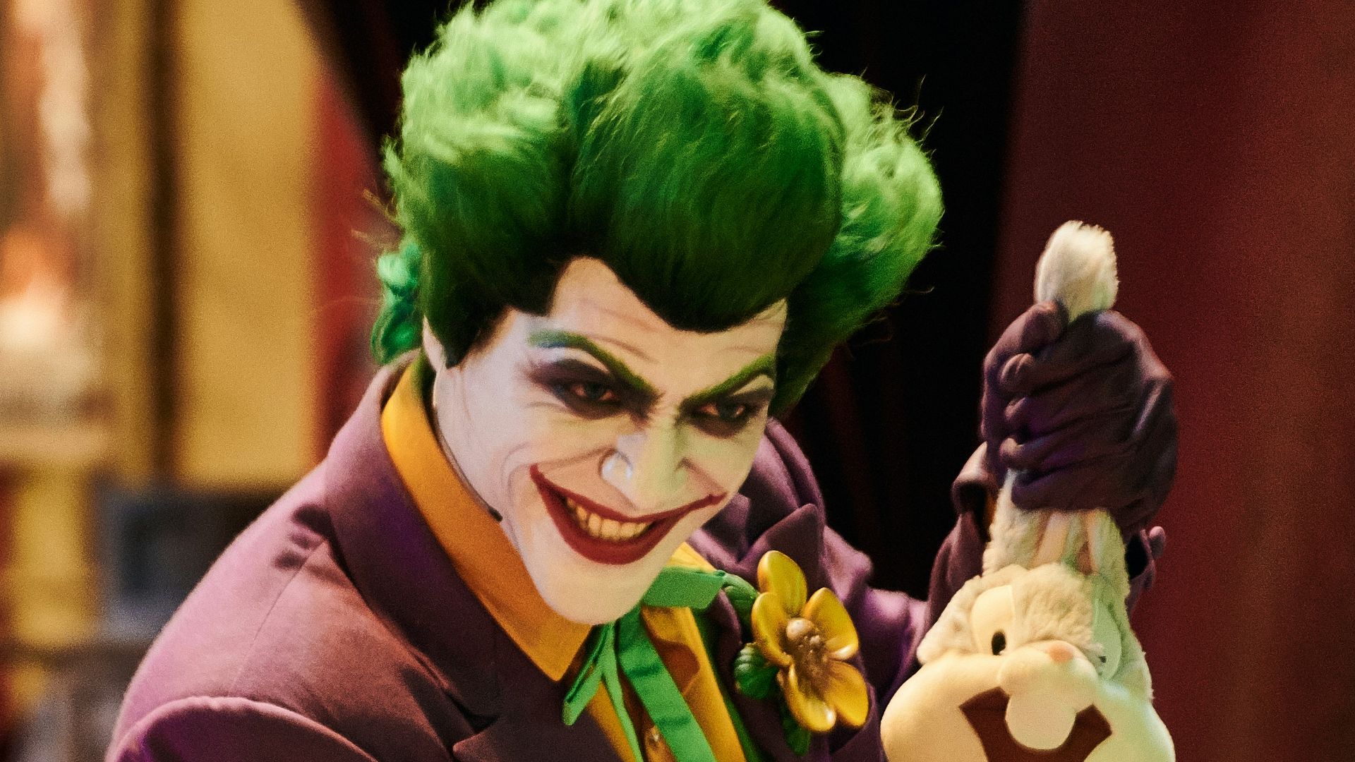 man wearing The Joker costume