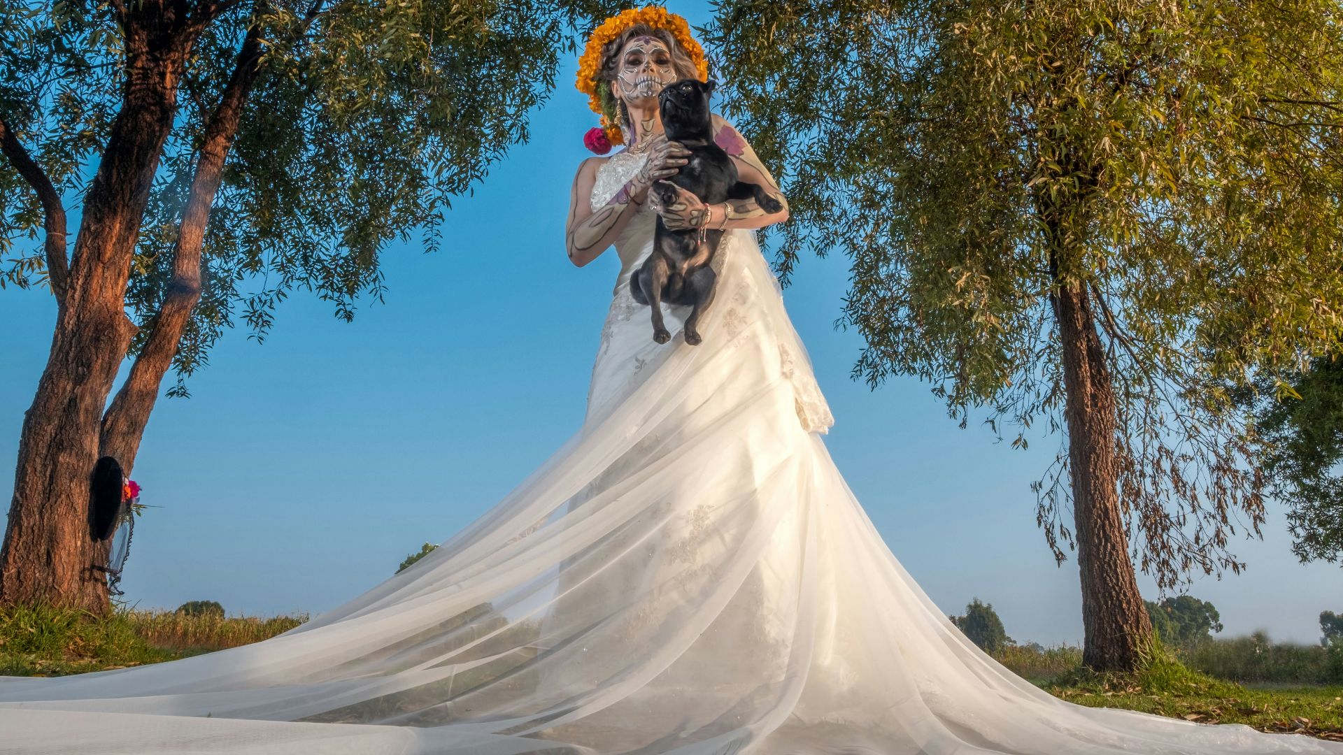 a man in a white dress