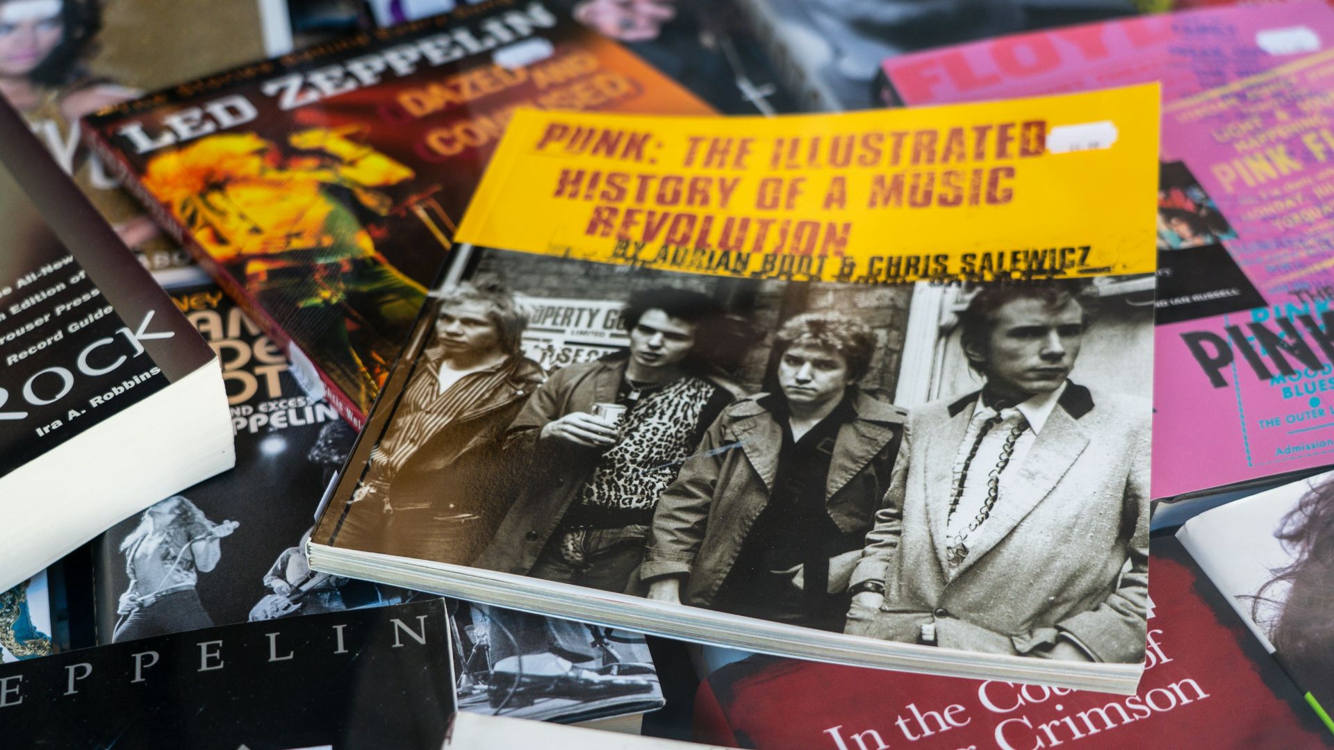 a pile of books sitting on top of a table