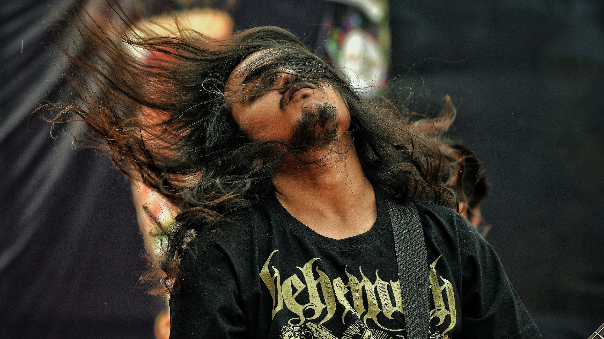 unknown person playing guitar