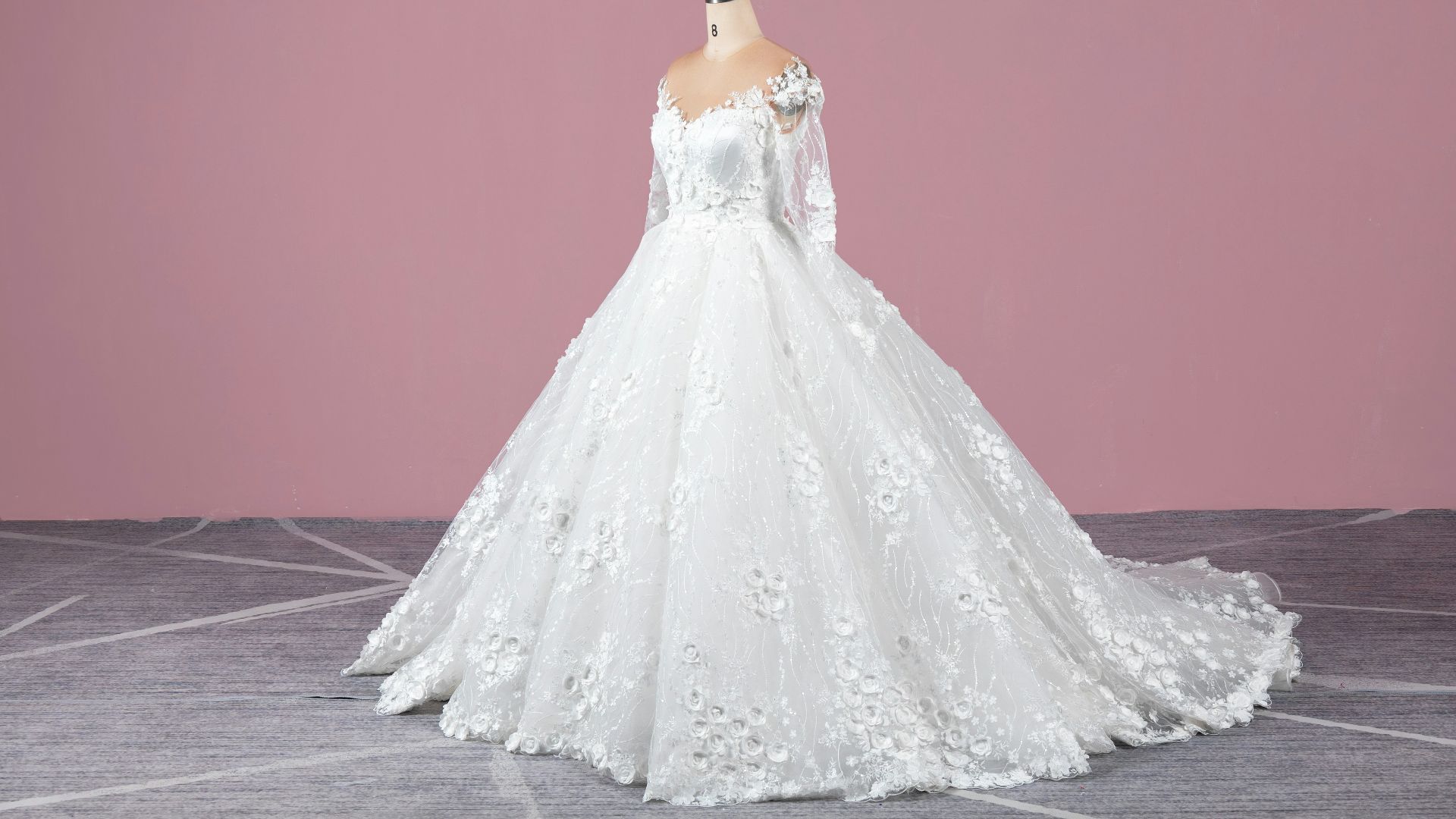 a white wedding dress on a mannequin