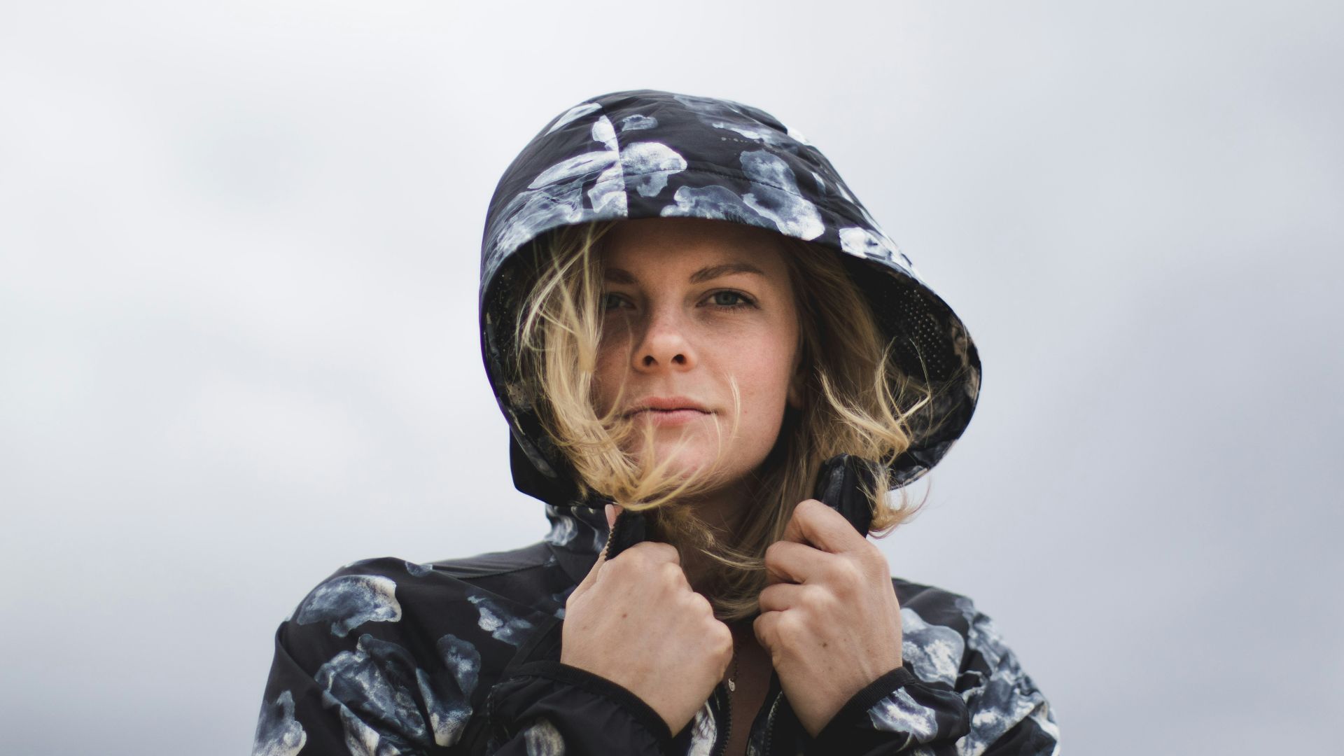 close-up photography of woman wearing hoodie