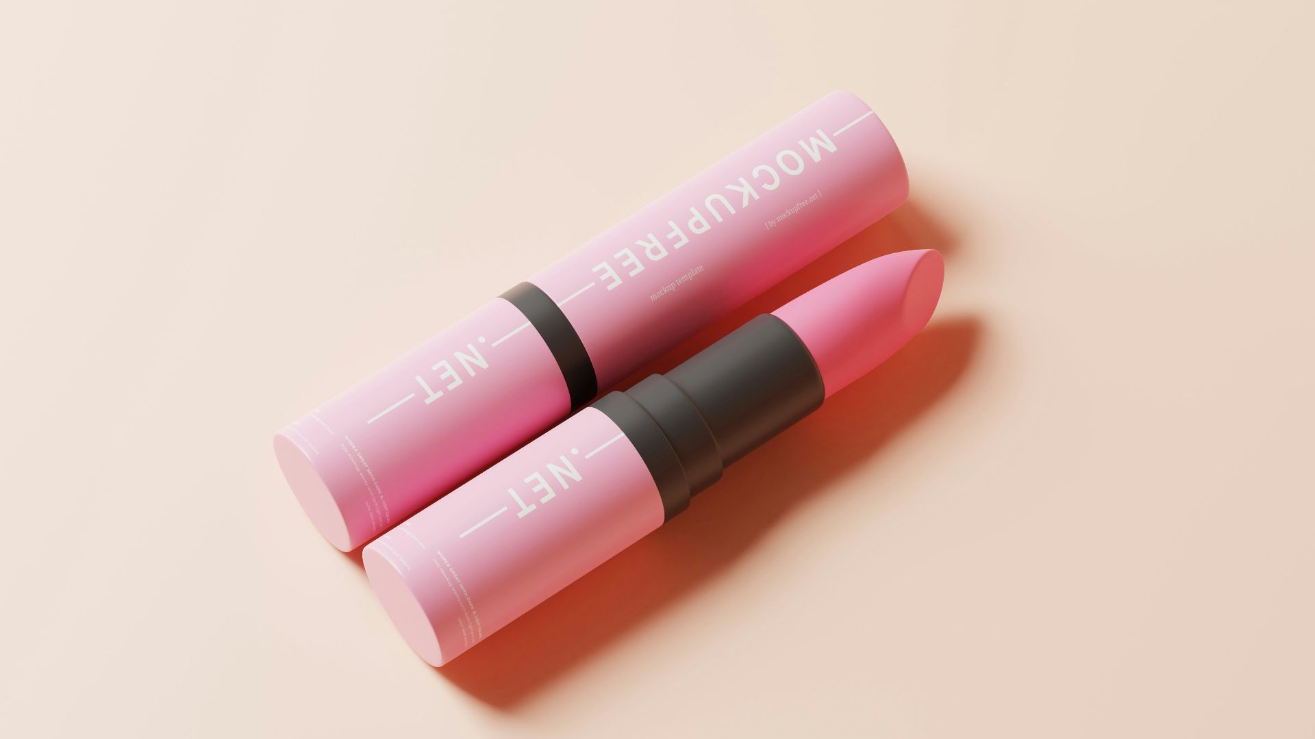 two pink lipsticks sitting on top of each other