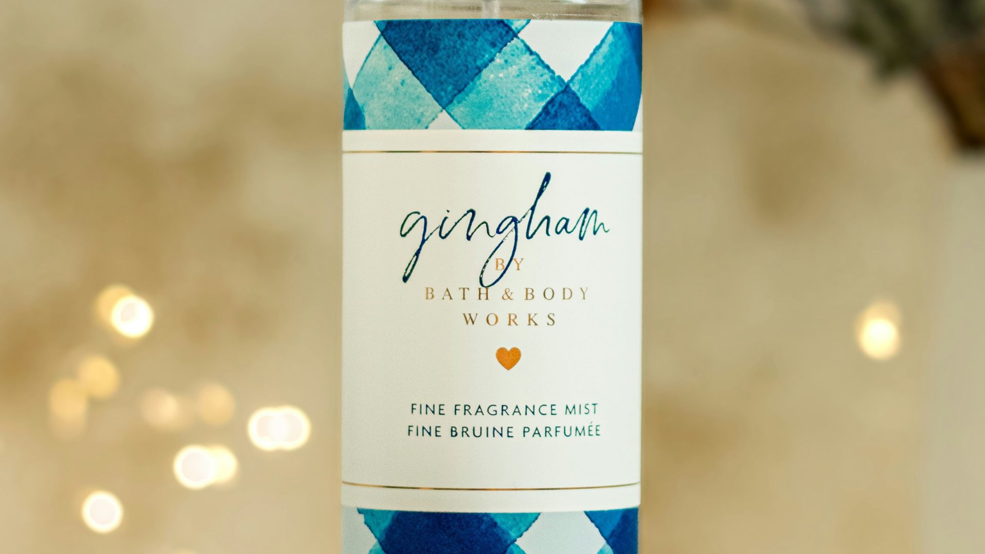 a bottle of perfume sitting on a table