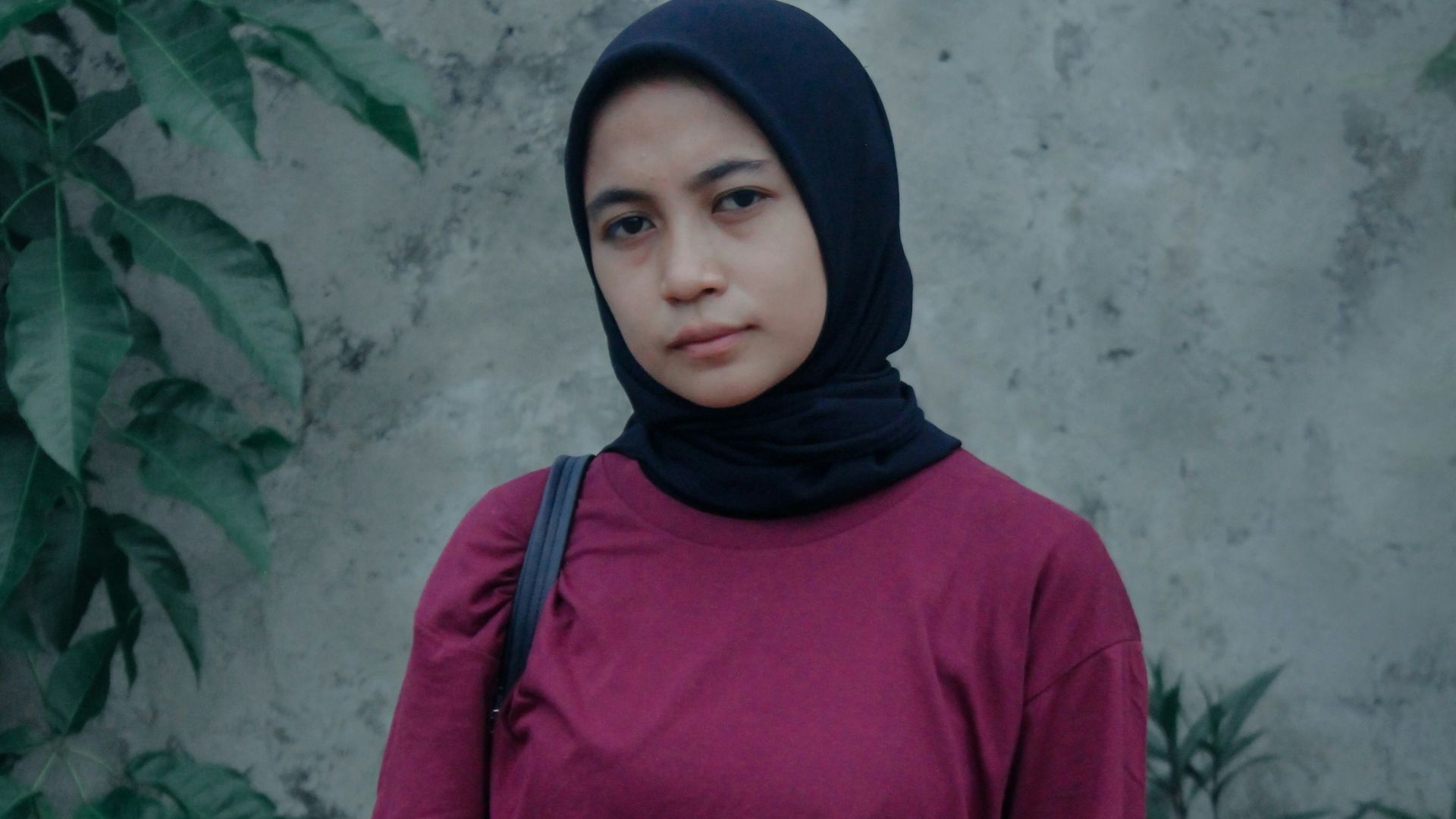 woman in red long sleeve shirt and blue denim jeans