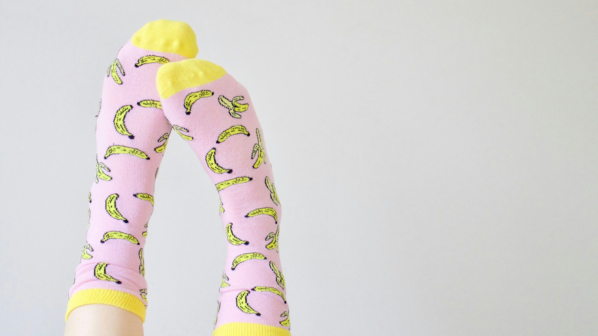 pair of pink-and-yellow socks